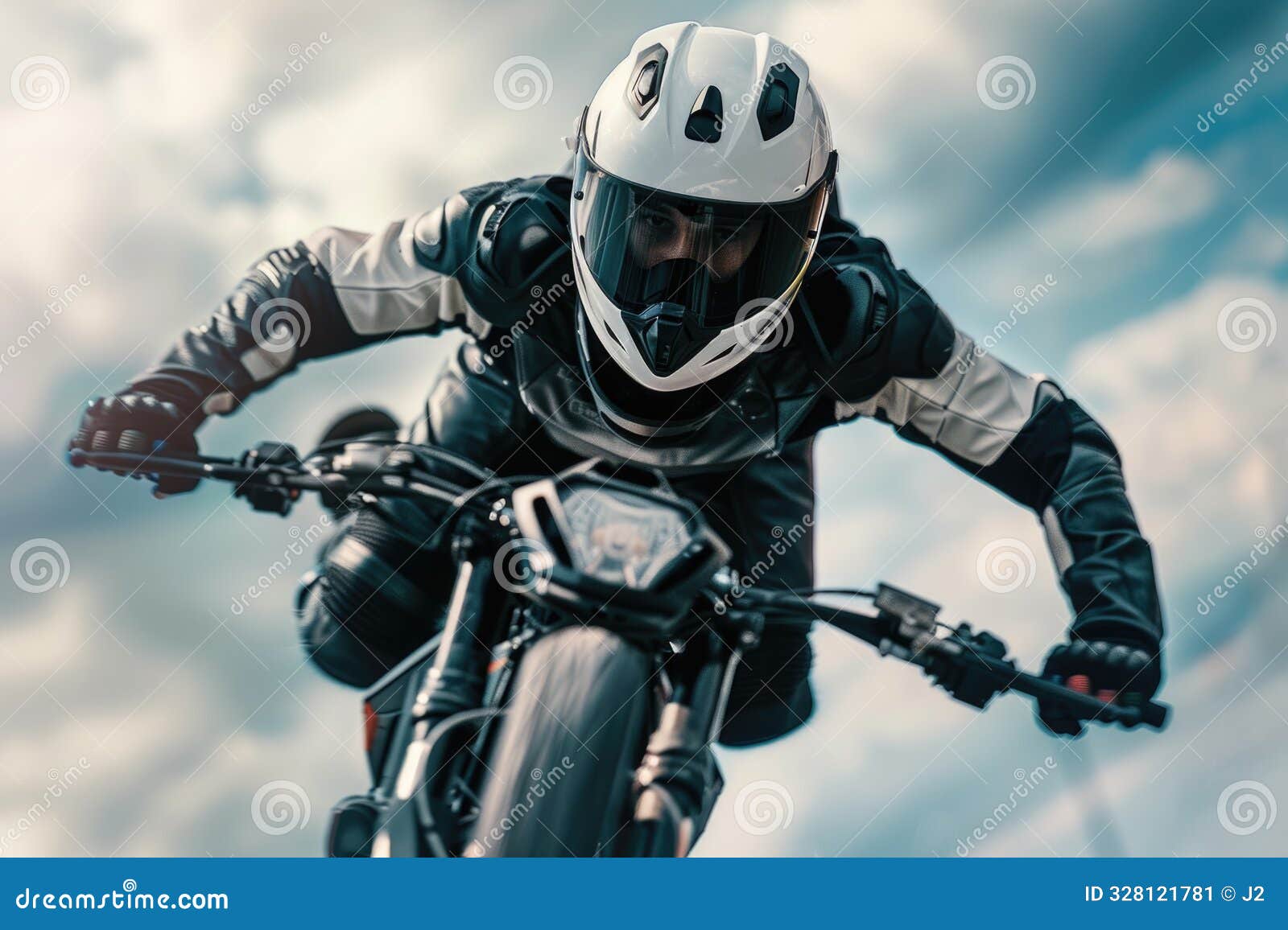 stunt performer in action, executing a daring maneuver, dressed in protective gear and helmet. dynamic backdrop enhances