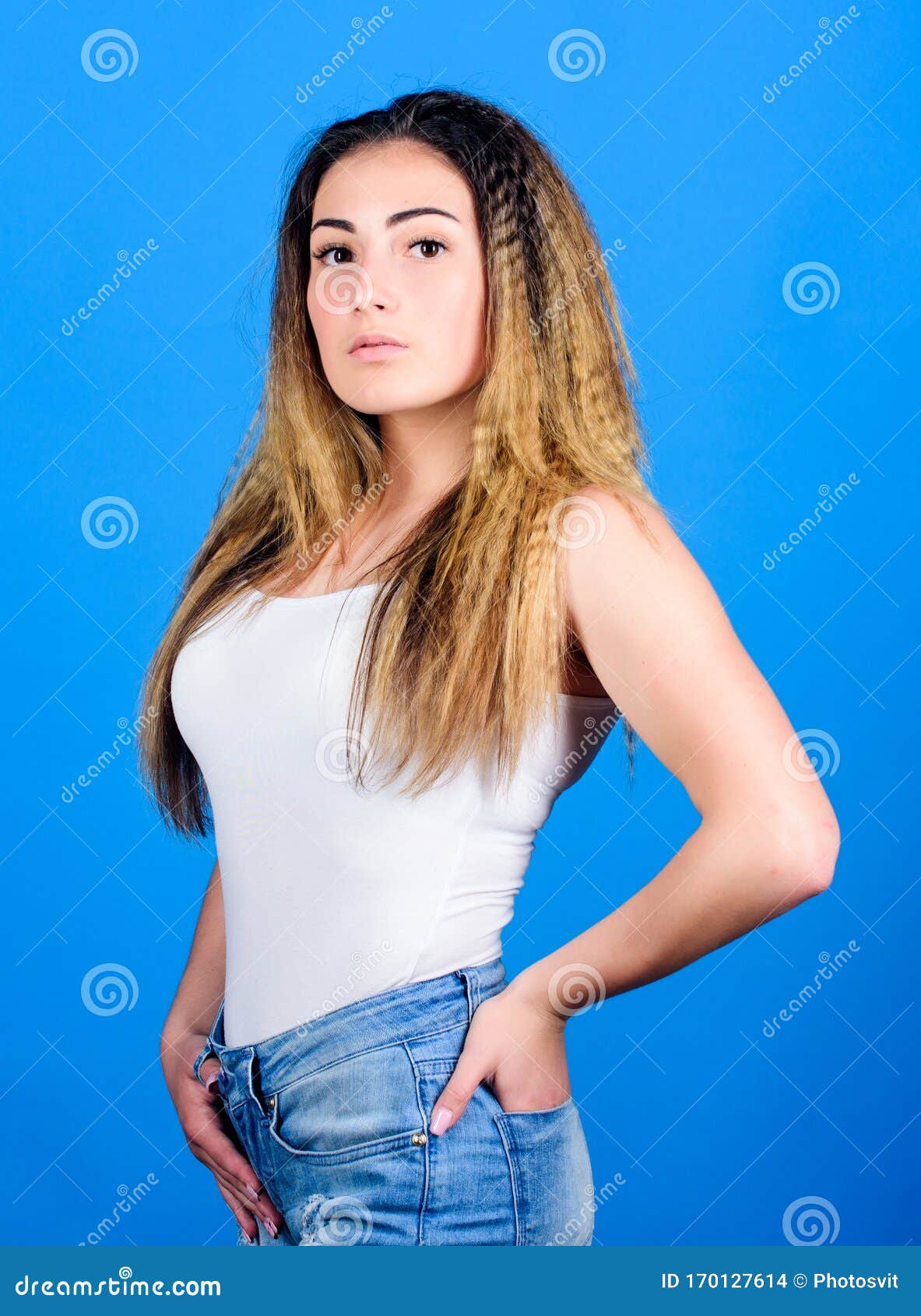 Styling Cosmetic Product. Crimped Hairstyles. Woman Stylish Hairstyle on  Blue Background Stock Photo - Image of beauty, background: 170127614