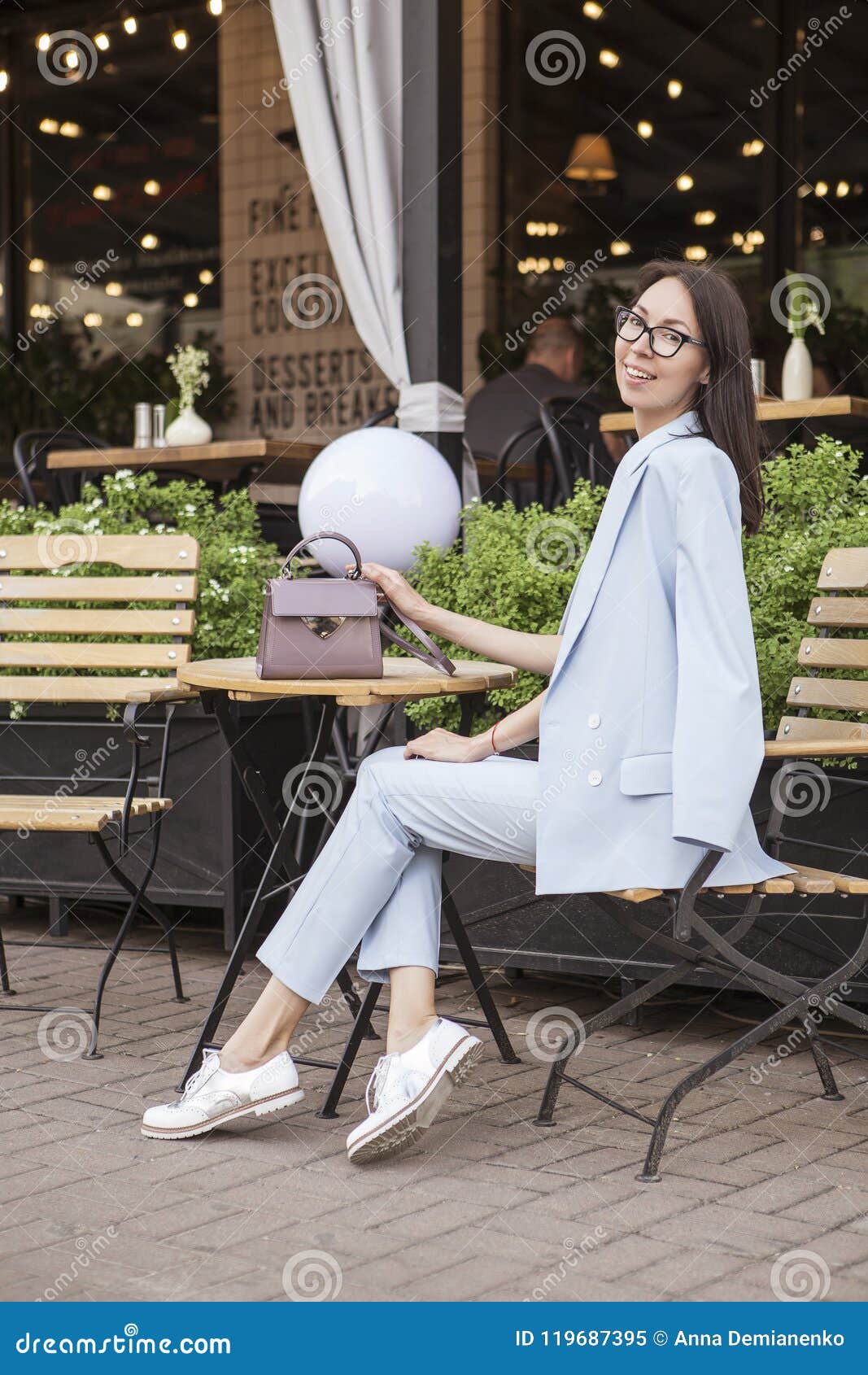 Stylish Asian-caucasian Woman on a Walk in European City in Smart Casual  Outfit and Glasses. she Has a Break from Her Work Stock Image - Image of  disposer, portrait: 119687395