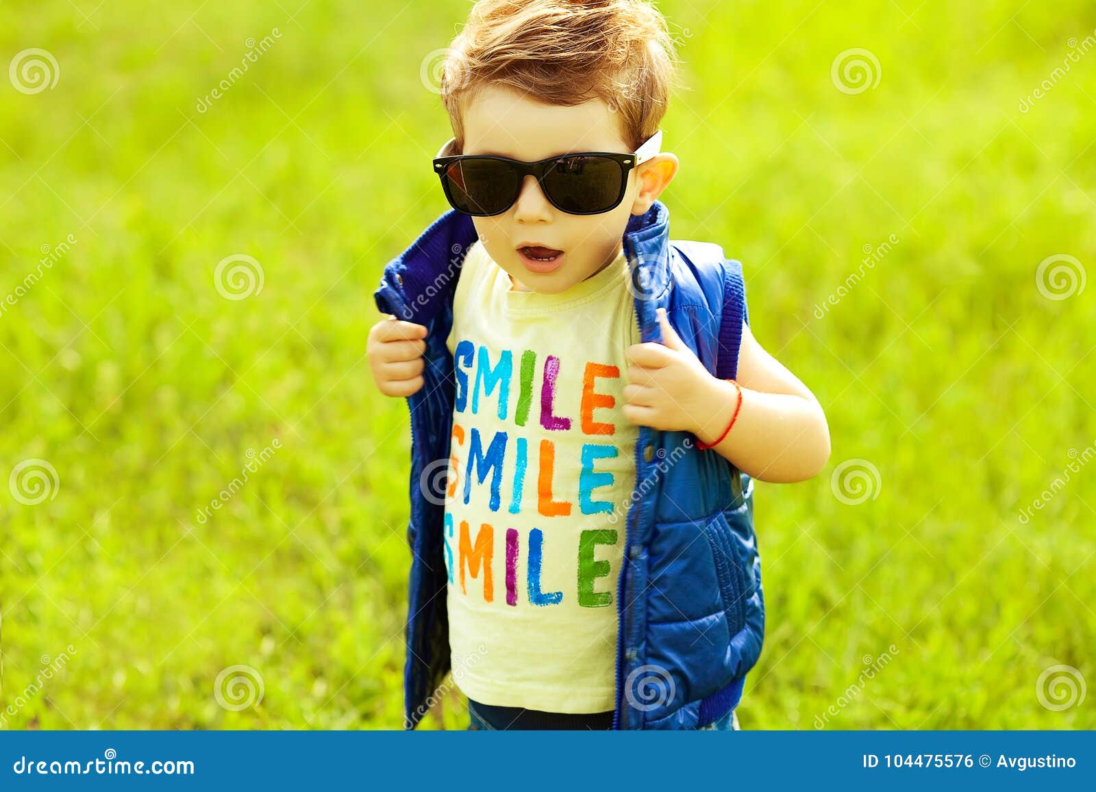 Stylish Baby Boy with Ginger Red Hair in Trendy Sunglasses Stock Photo -  Image of male, healthy: 104475576