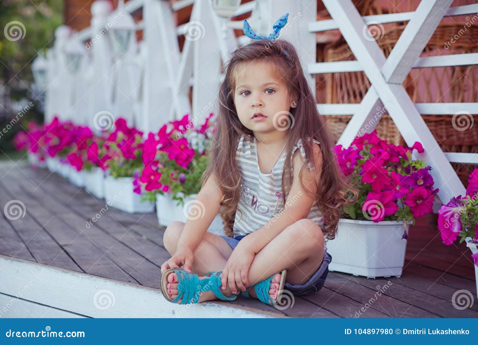 Stylish Beautifull Cute Baby Girl with Brunette Hair Posing on ...