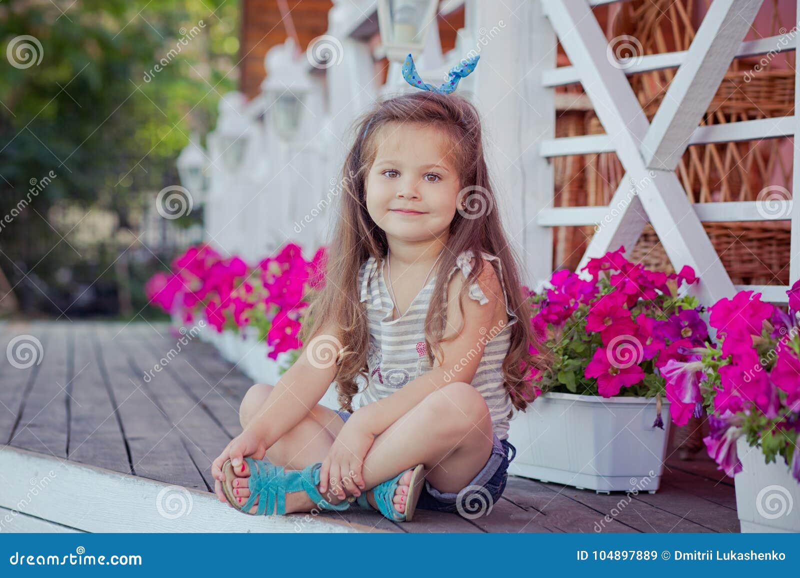 Stylish Beautifull Cute Baby Girl with Brunette Hair Posing on ...