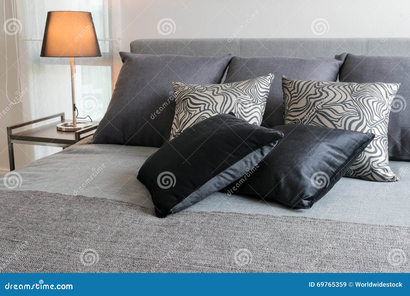 Stylish Bedroom Interior Design with Black Patterned Pillows on B Stock