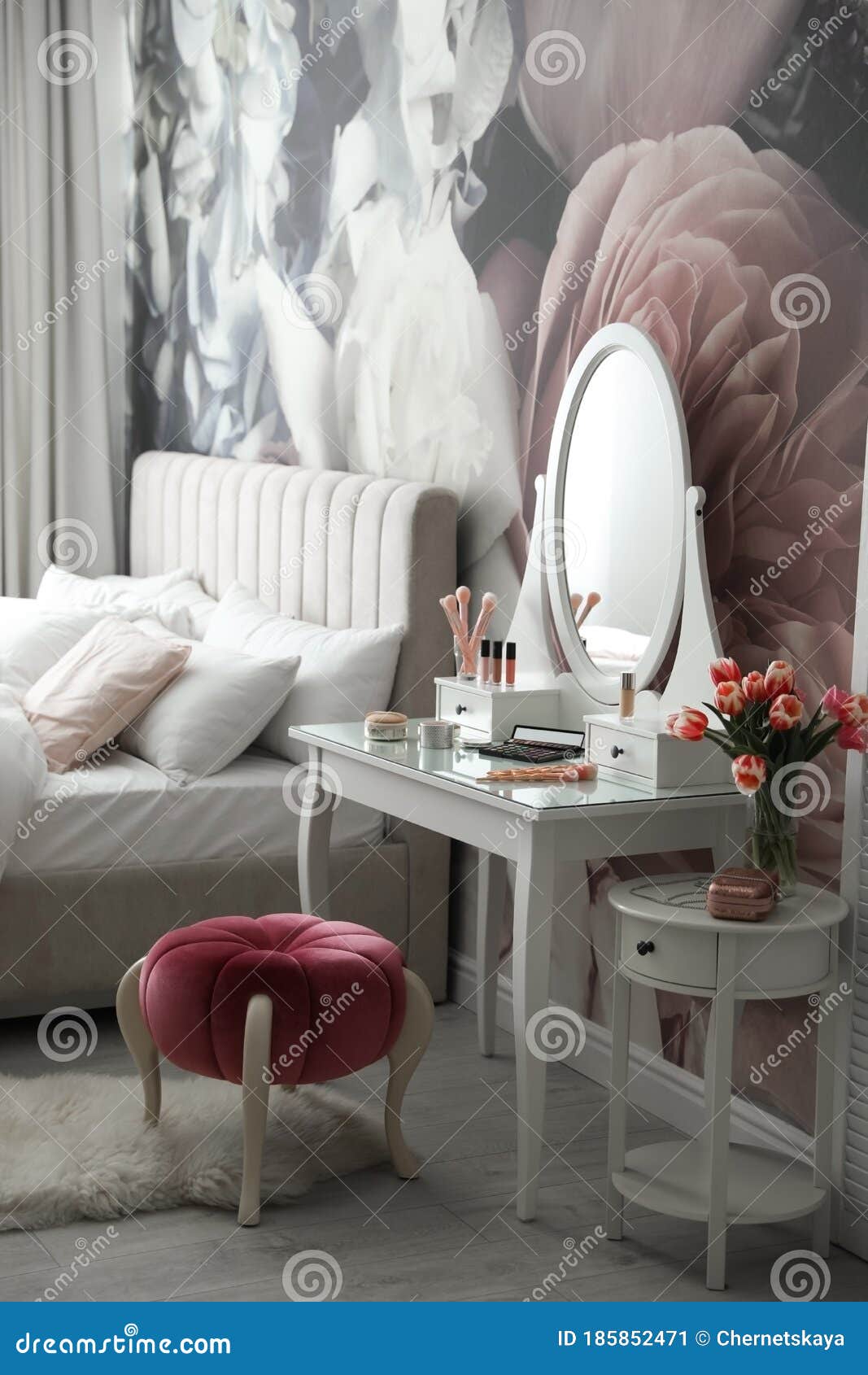 Bedroom Interior with Elegant Dressing Table and Floral Wallpaper Stock