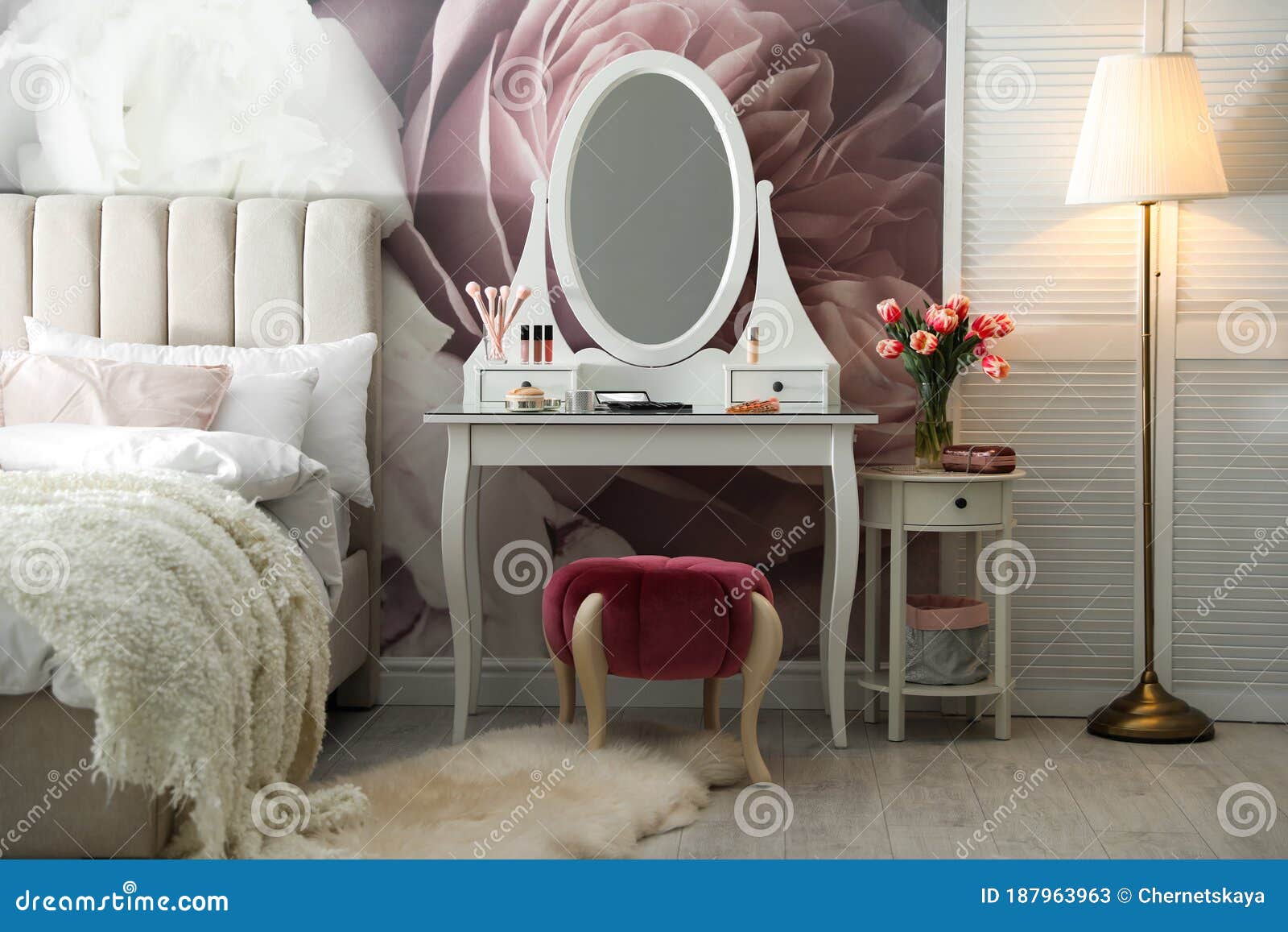 Bedroom Interior with Elegant Dressing Table and Floral Wallpaper Stock