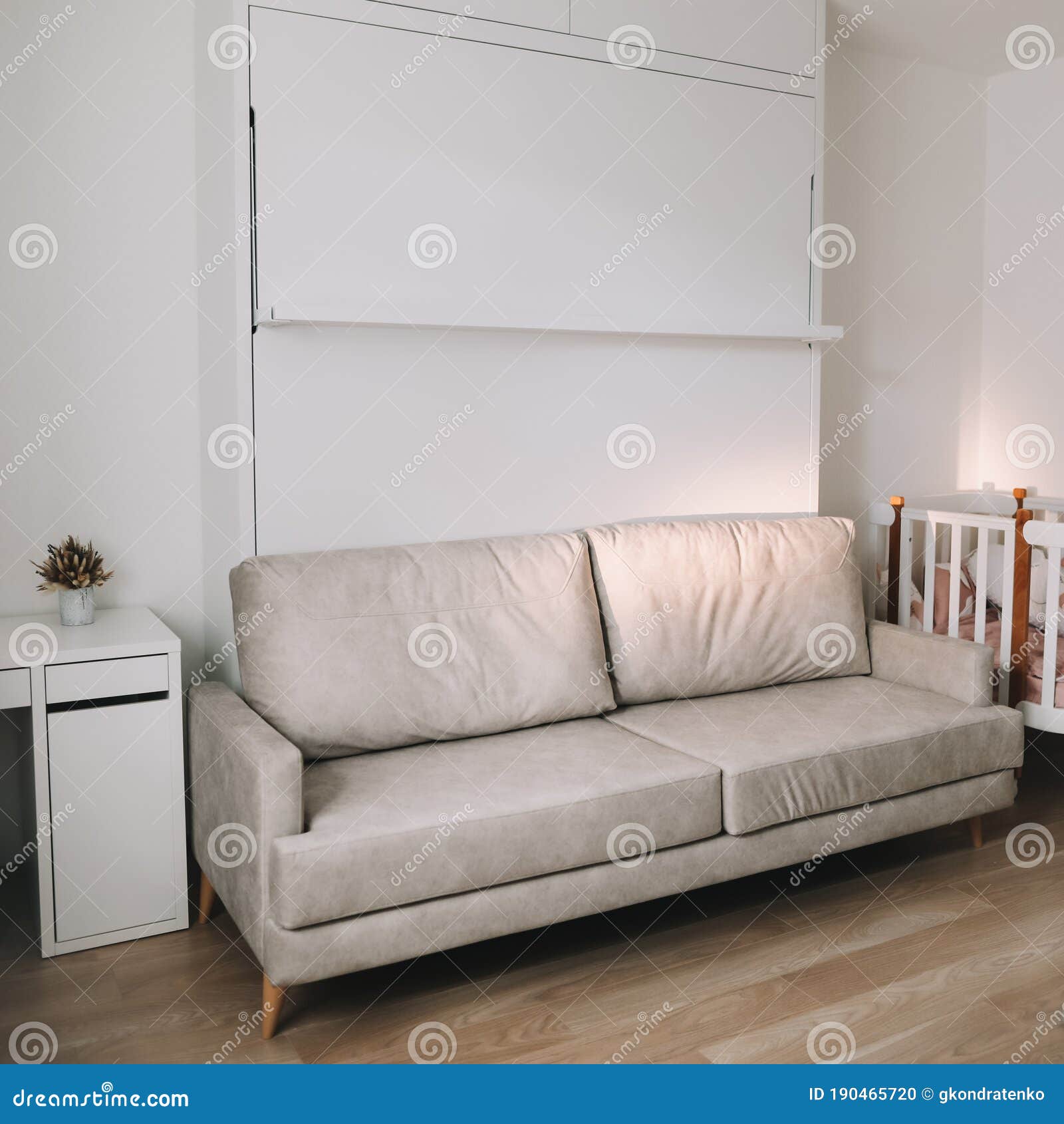 baby crib in living room