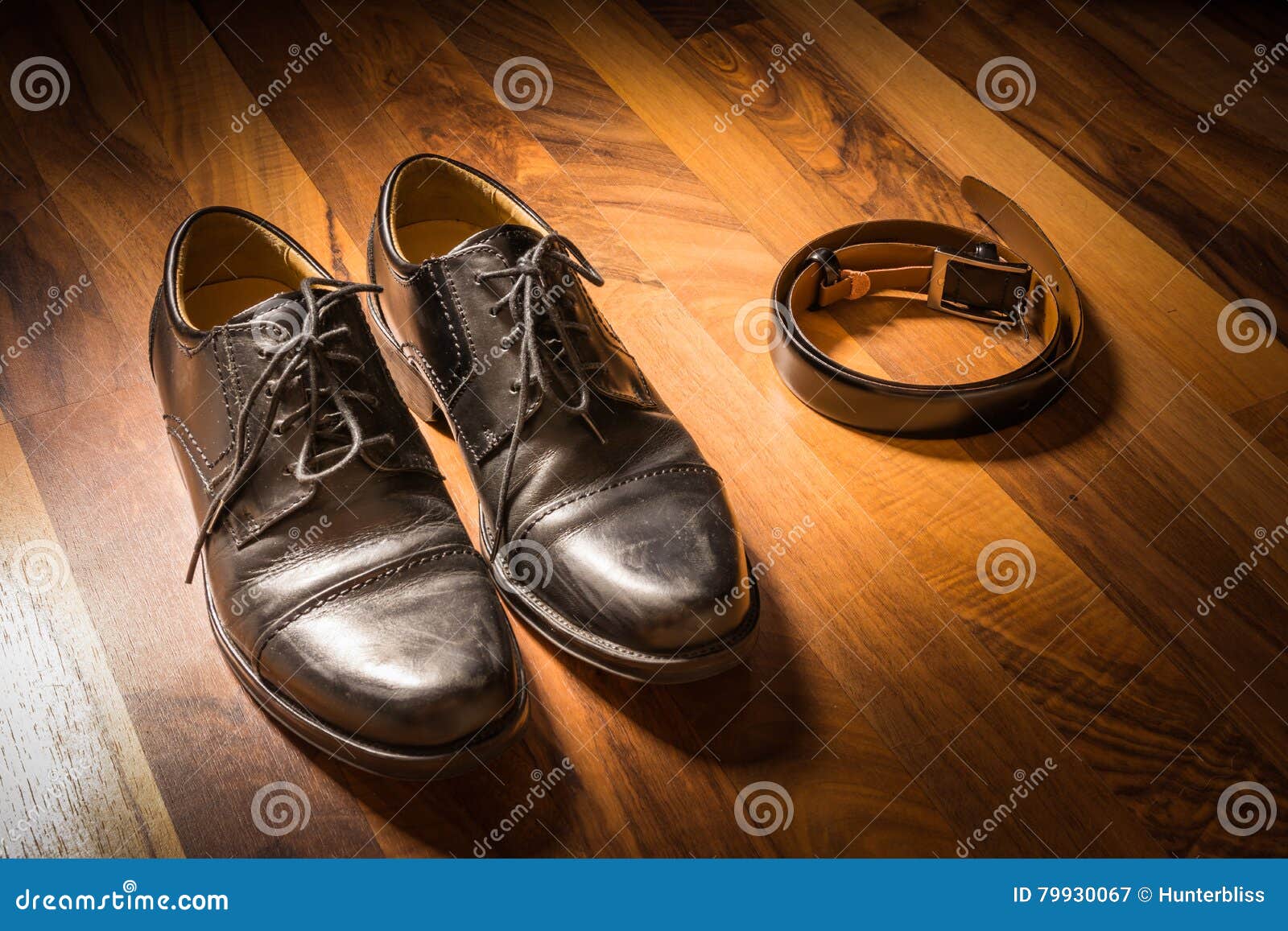 Stylish Black Handcrafted Dress Shoes and Leather Belt on Wooden Stock ...