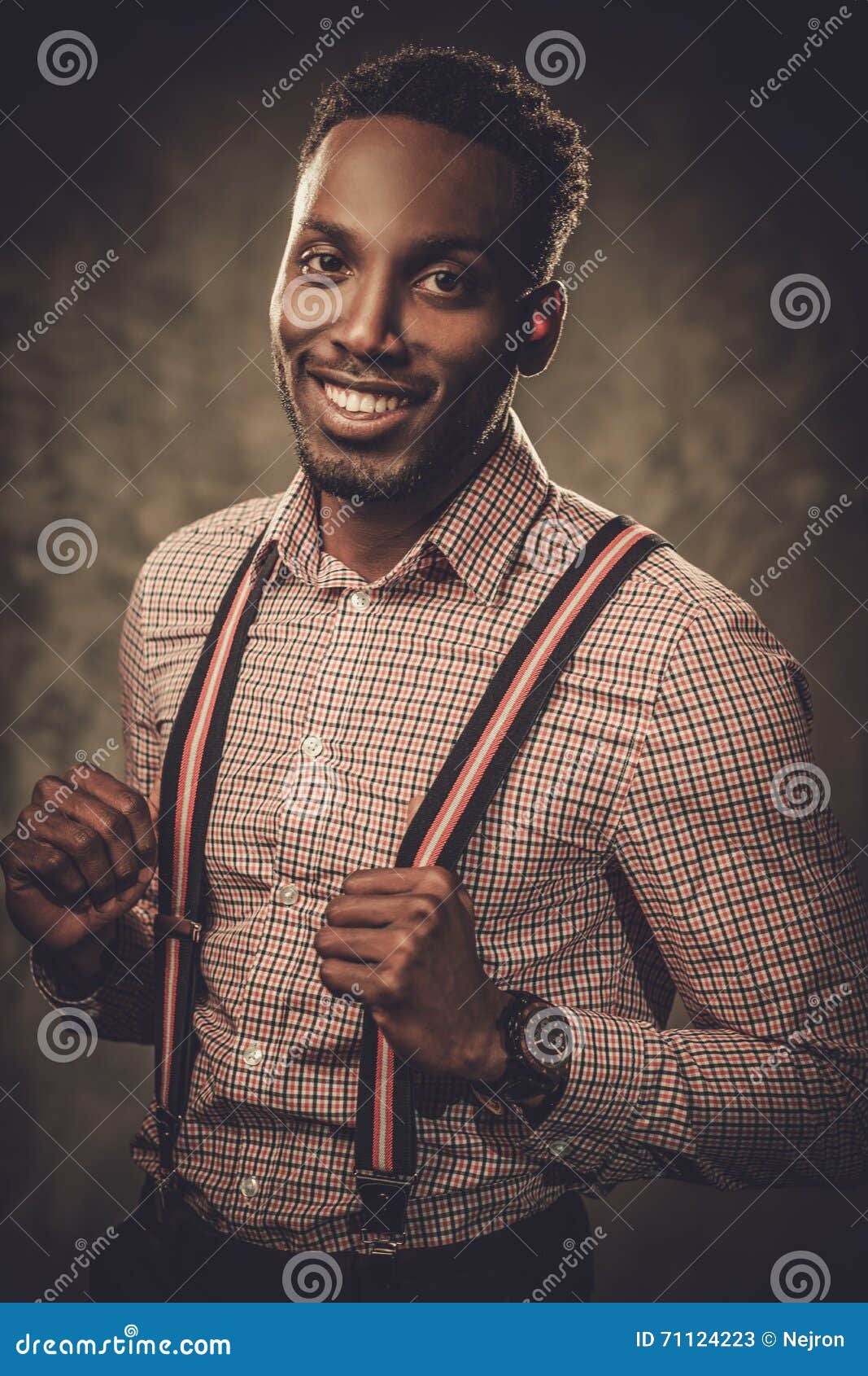 Stylish Black Man With Suspenders Posing On Dark Background. Stock ...