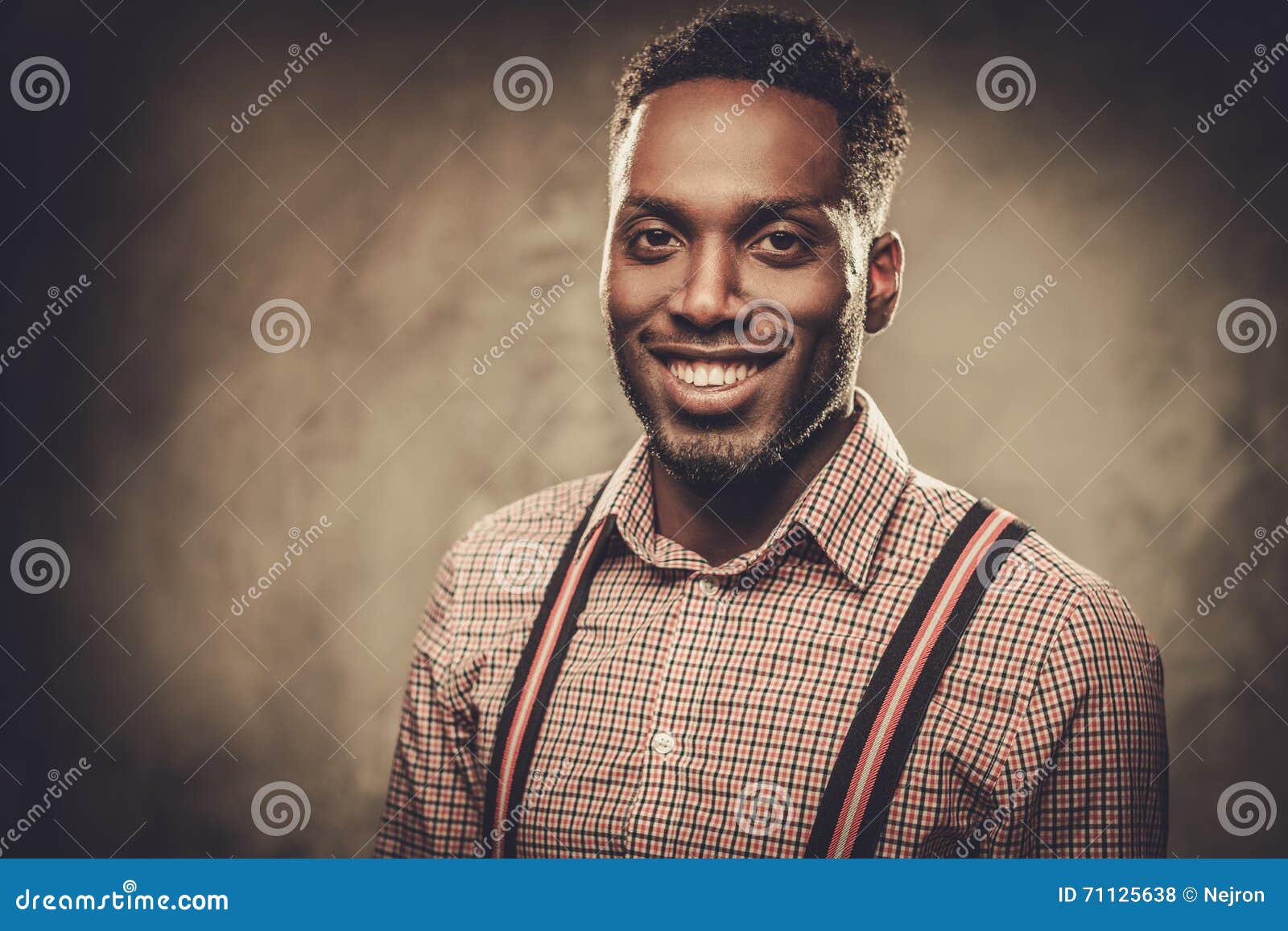 Stylish Black Man with Suspenders Posing on Dark Background. Stock ...