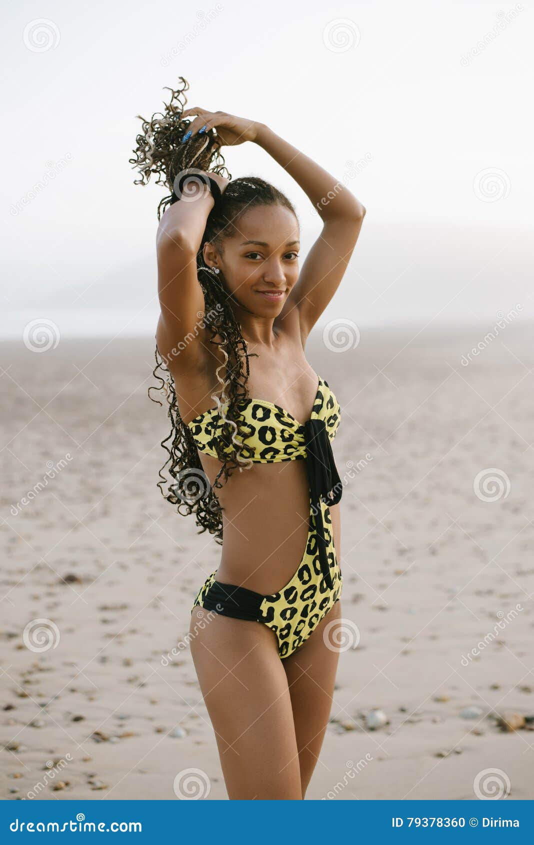 Stylish Brazilian Woman with Dreadlocks in Fashion Bikini Stock