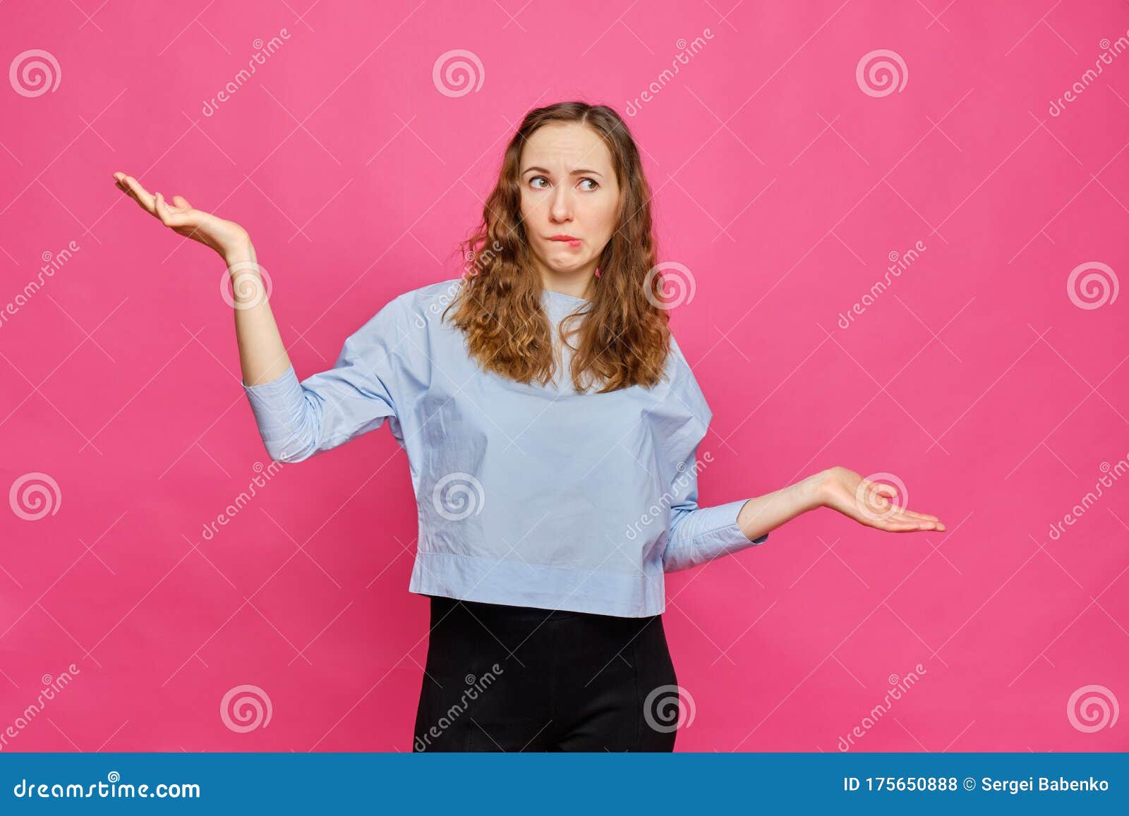 Stylish Caucasian Girl in a Pale Blue T-shirt Shows Hands Abstract ...