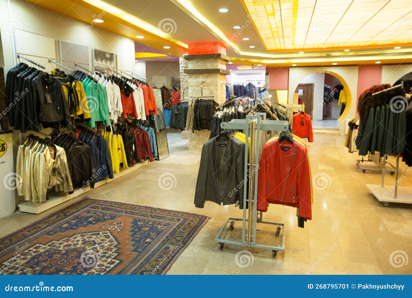 Clothes on hangers in shop editorial photo. Image of room 268795701