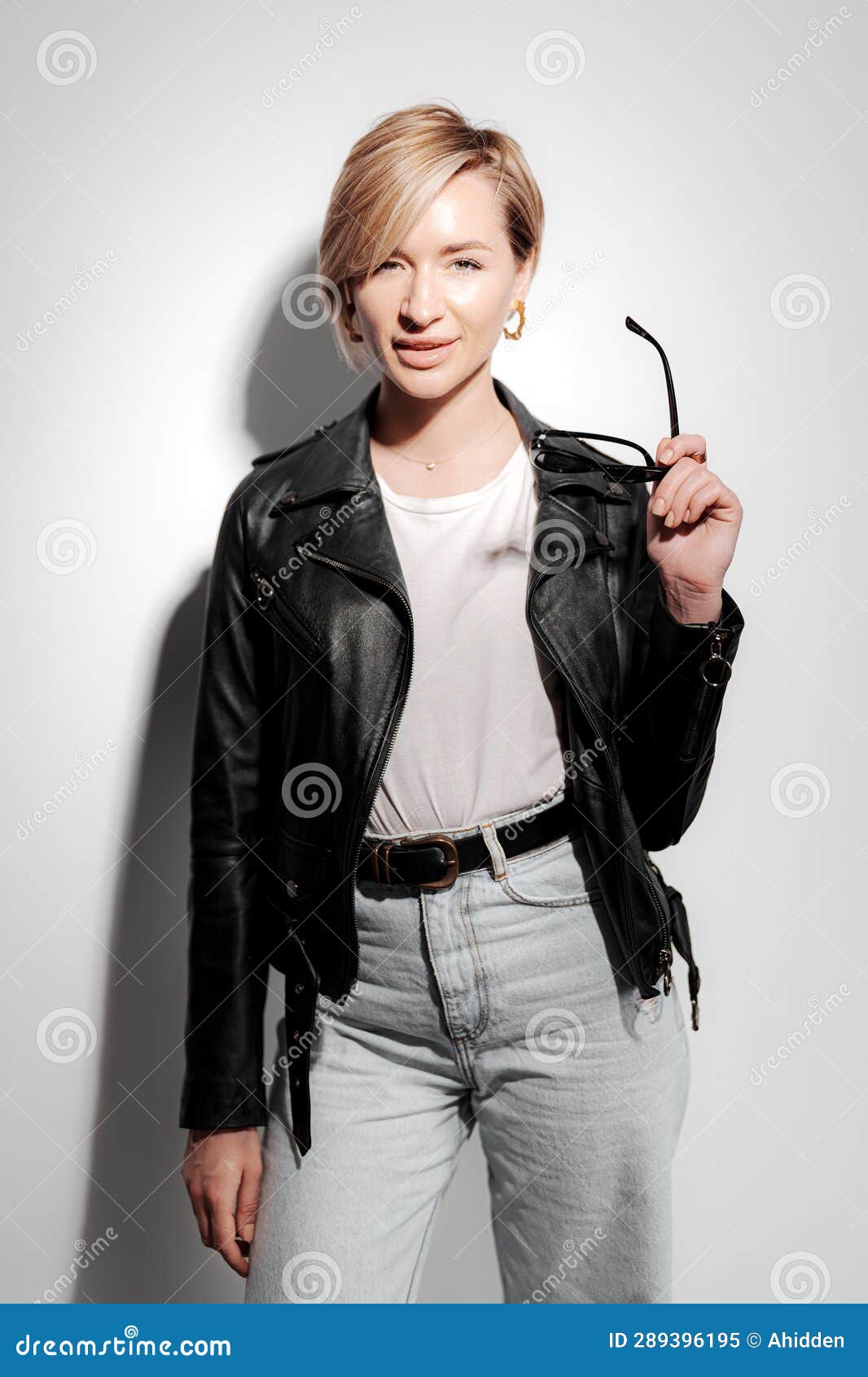 Stylish and Confident Young Woman in Black Leather Jacket Stock Image ...