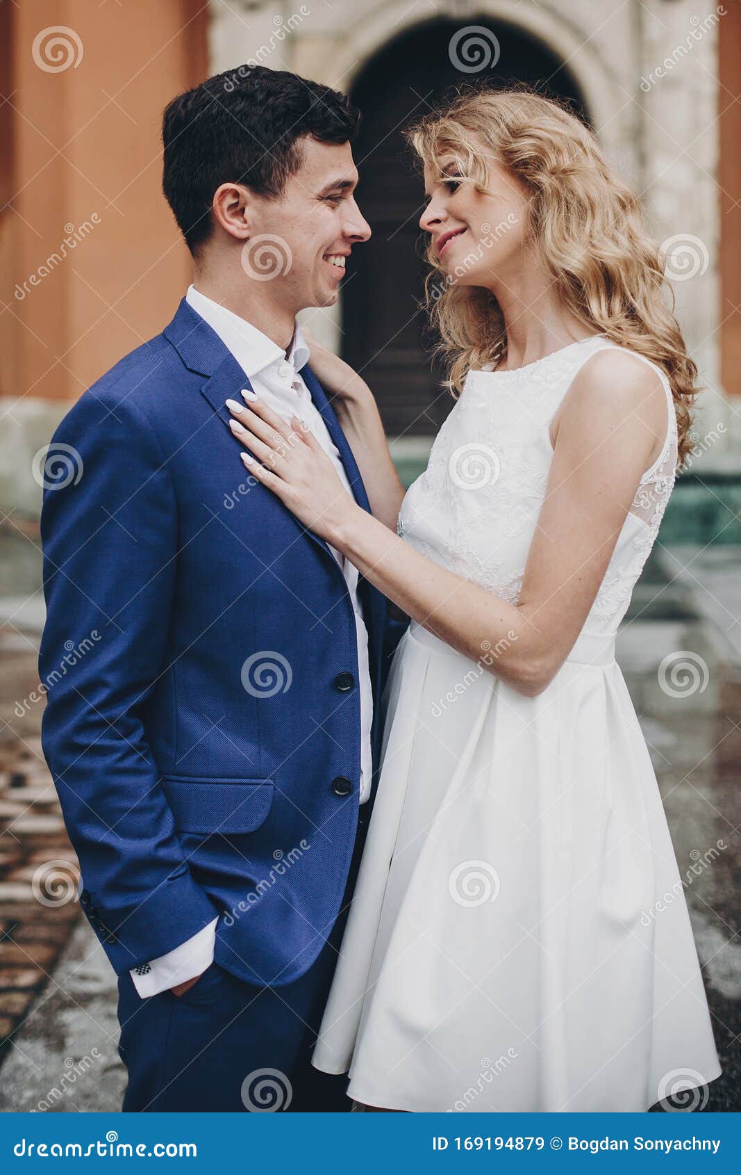 Stylish Couple Embracing In European City Street Sensual Romantic Moment Fashionable Bride And