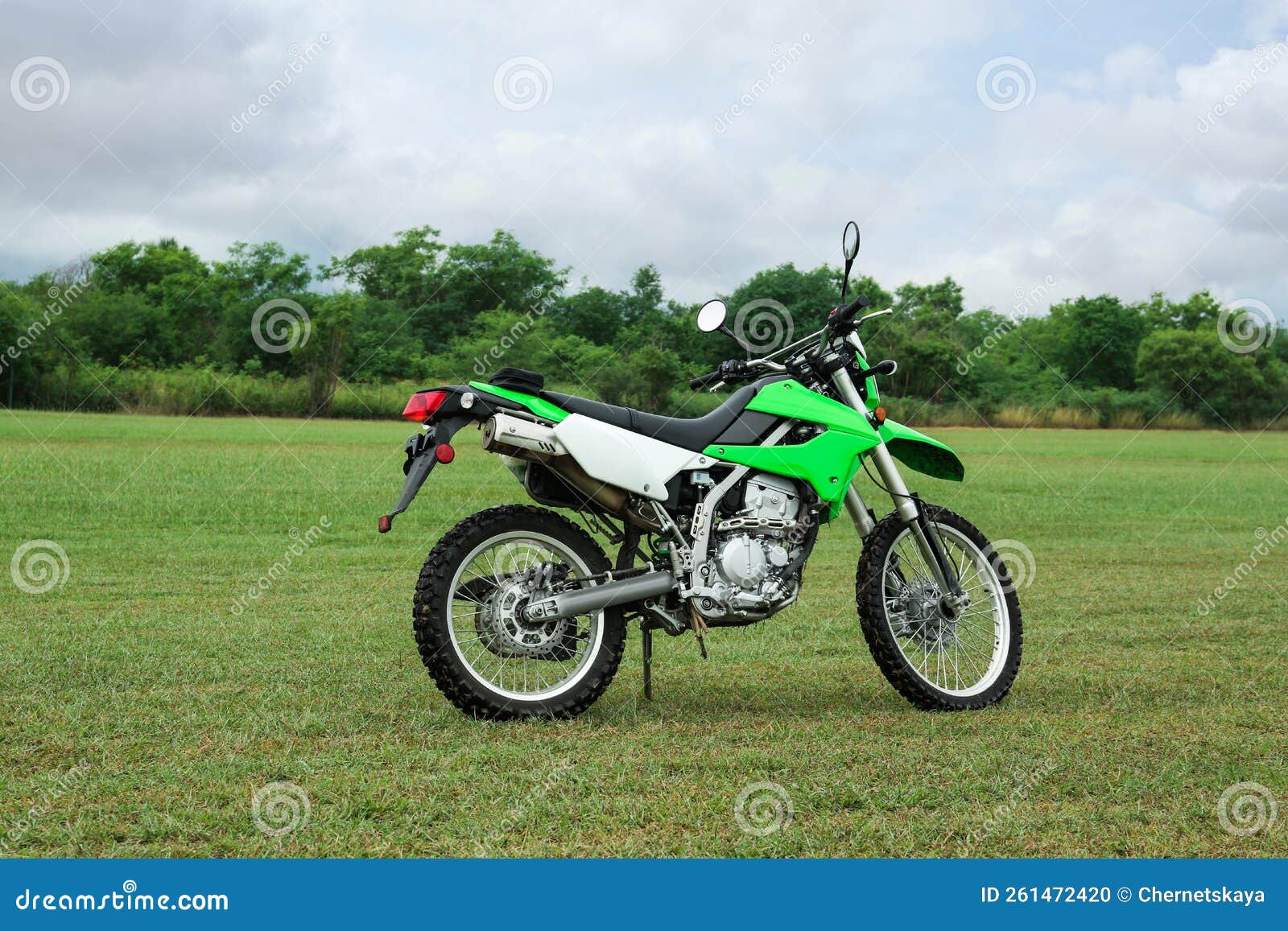 Stylish Cross Motorcycle on Green Grass Outdoors Stock Photo Image of