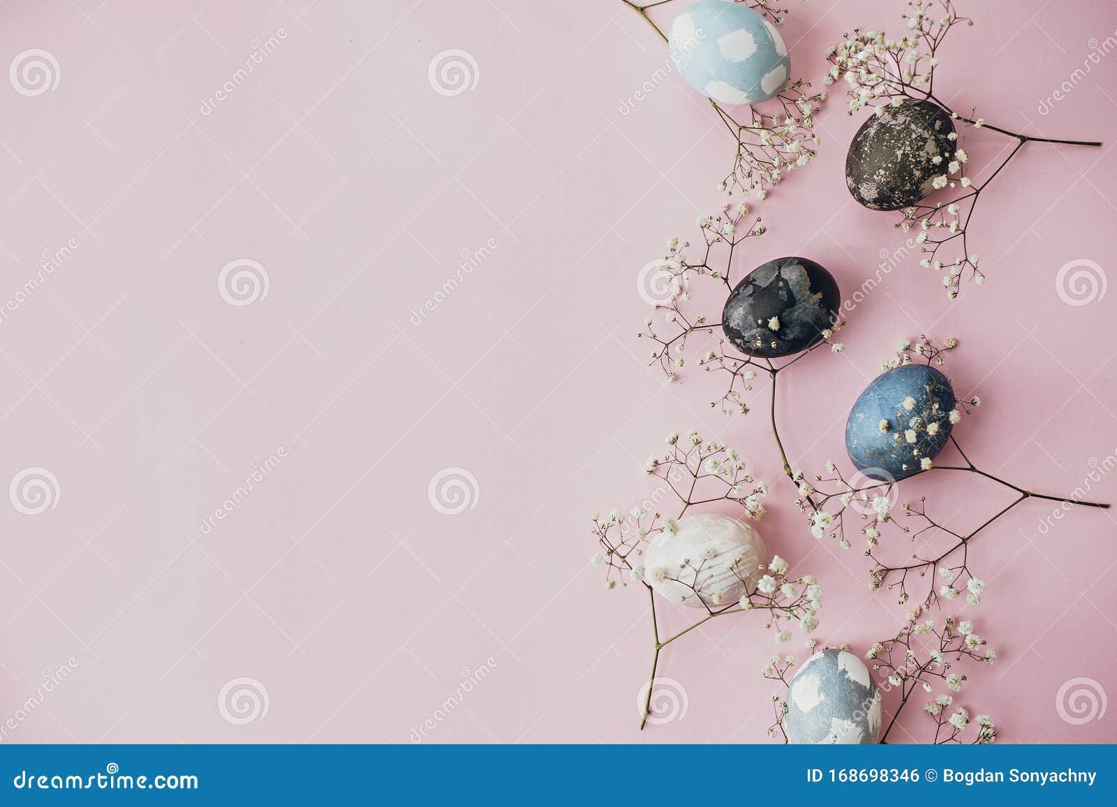 Stylish Easter Eggs and Spring Flowers Border on Pink Paper Flat Lay ...