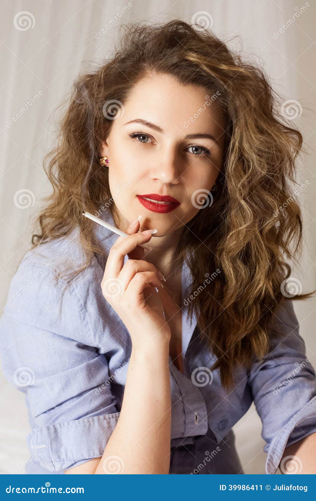 Stylish Emotional Girl With Red Lips And Curly Hair Is