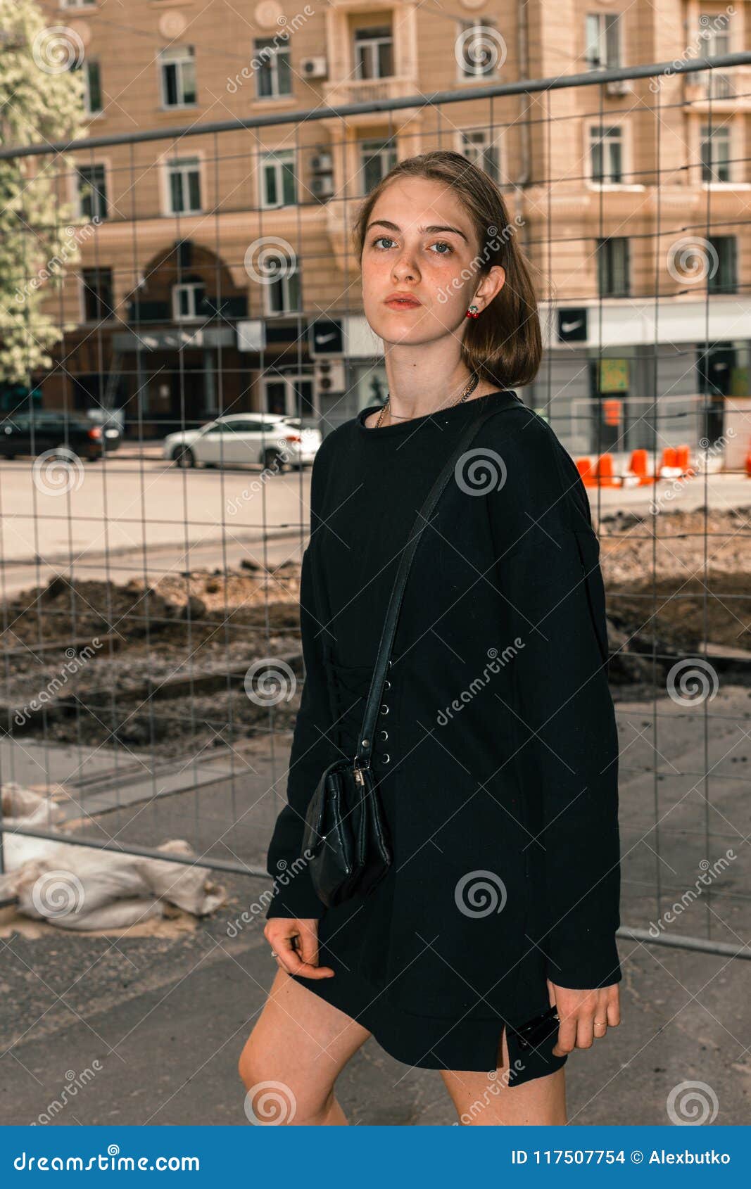 Stylish and Fashionable Girl with Glasses on the City Street Stock ...
