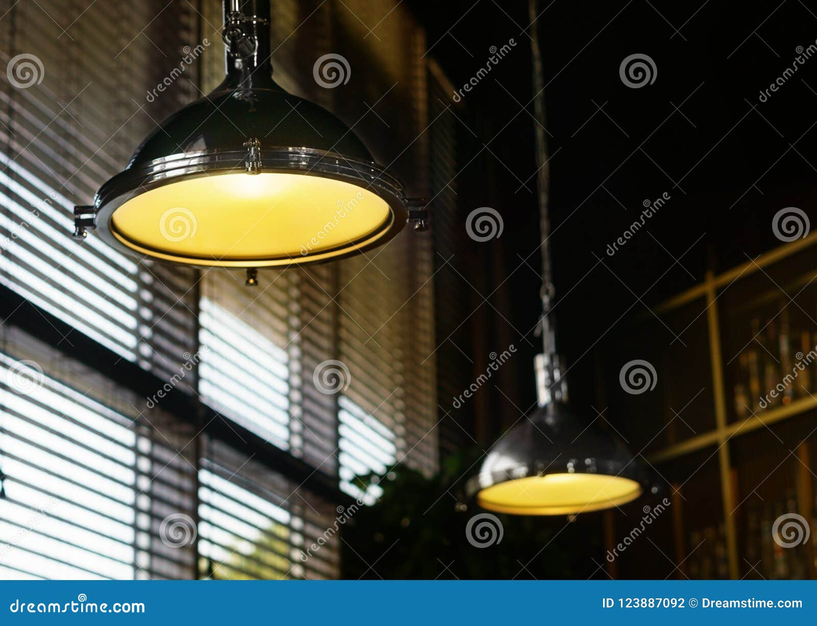 Stylish Fixtures Hanging From The Ceiling Shine Yellow Soft