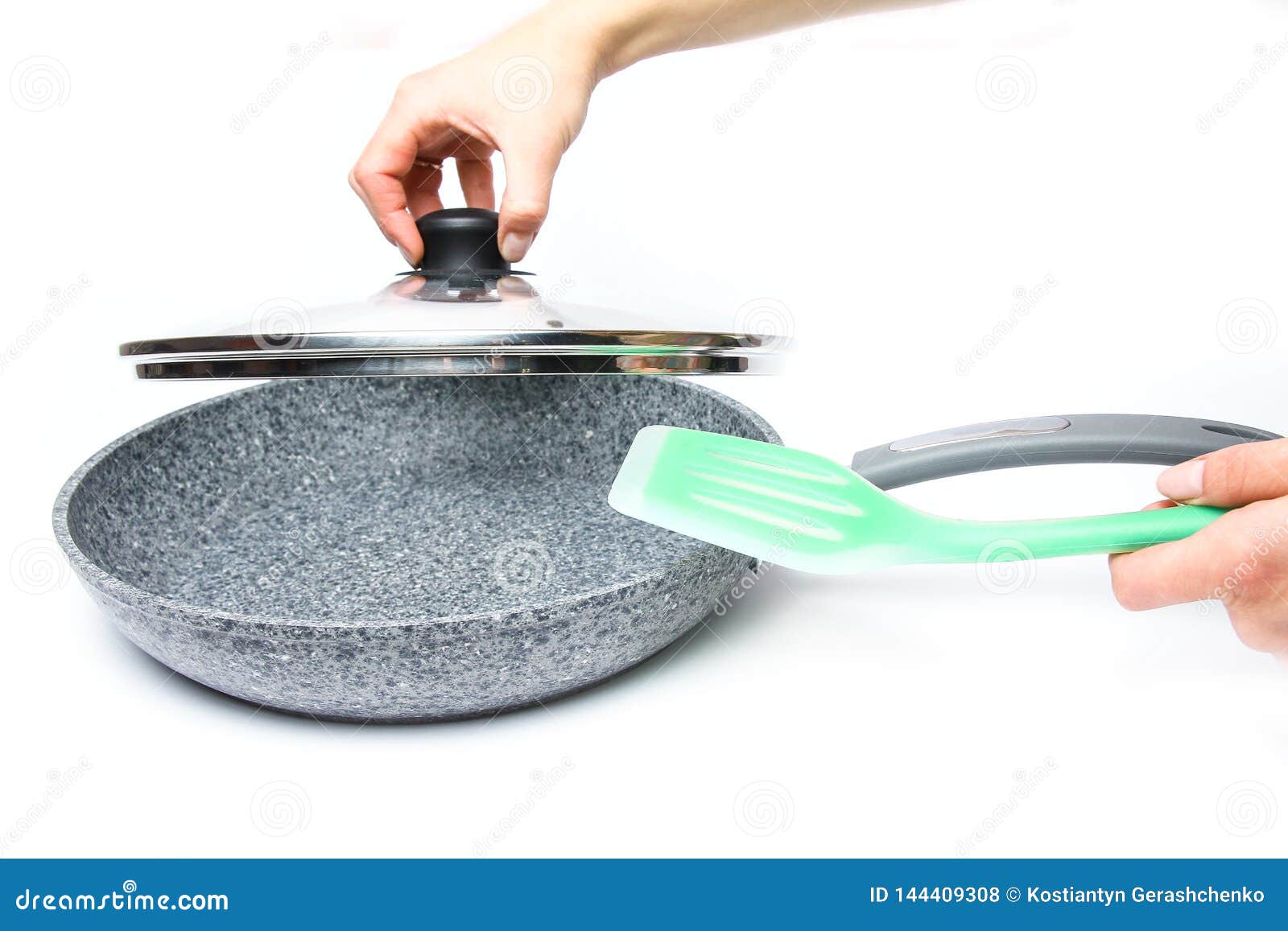 Stylish Frying Pan in Hands on a White Background Stock Photo Image