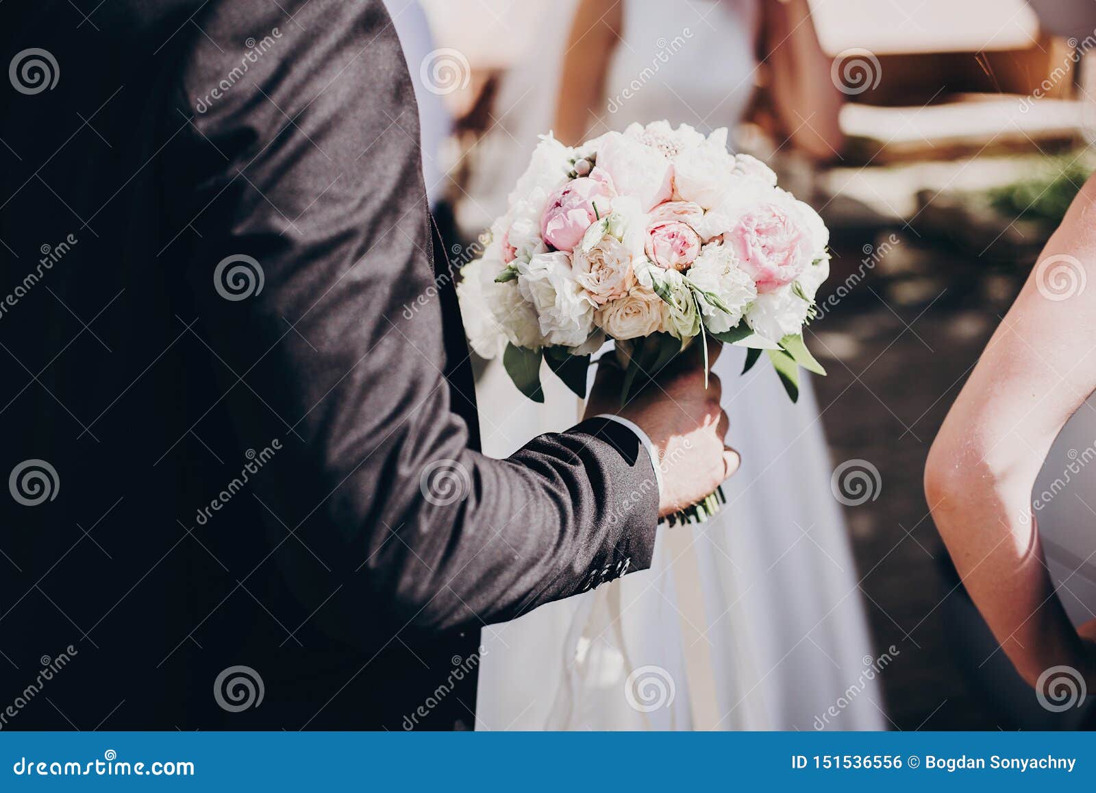 Stylish Groom in Black Suit Holding Modern Wedding Bouquet of Tender ...