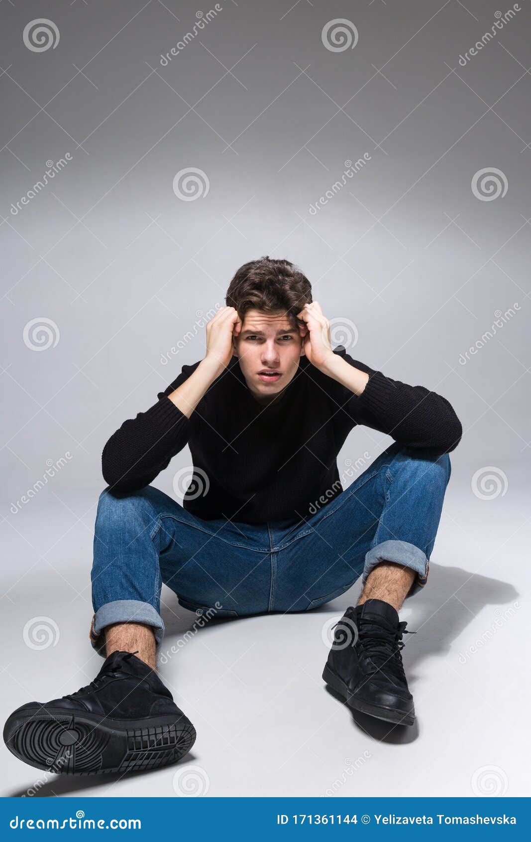 Male Pose Stock Photos, Images, & Pictures | Men casual, Men looks, Sitting  poses