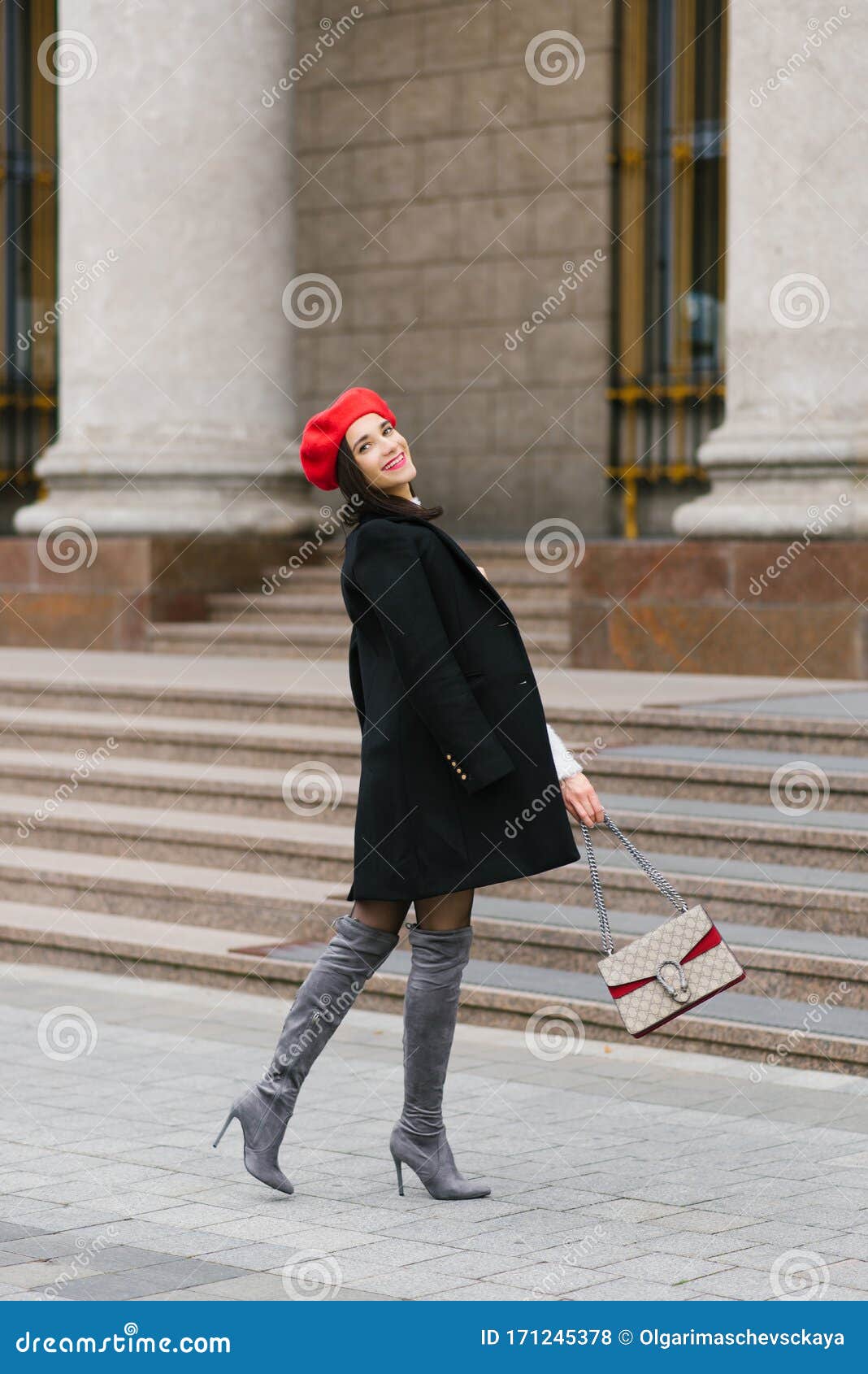 Stylish Happy Girl in a Black Coat and Red Beret Walks Around a European  City and Smiles Stock Photo - Image of france, posing: 171245378