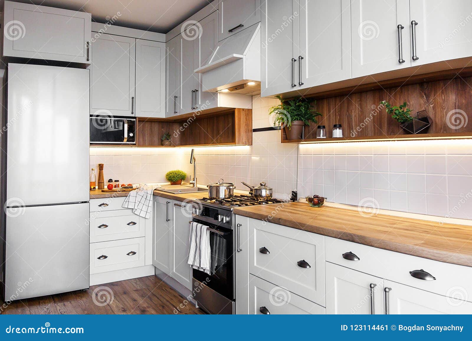 Stylish Kitchen Interior With Modern Cabinets And Stainless Steel