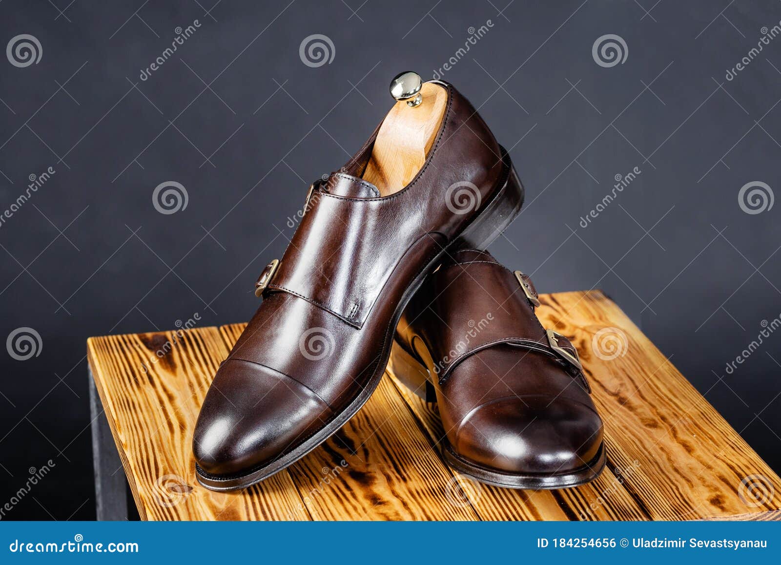 Stylish Leather Brown Shoes Against a Dark Background. Stock Photo ...