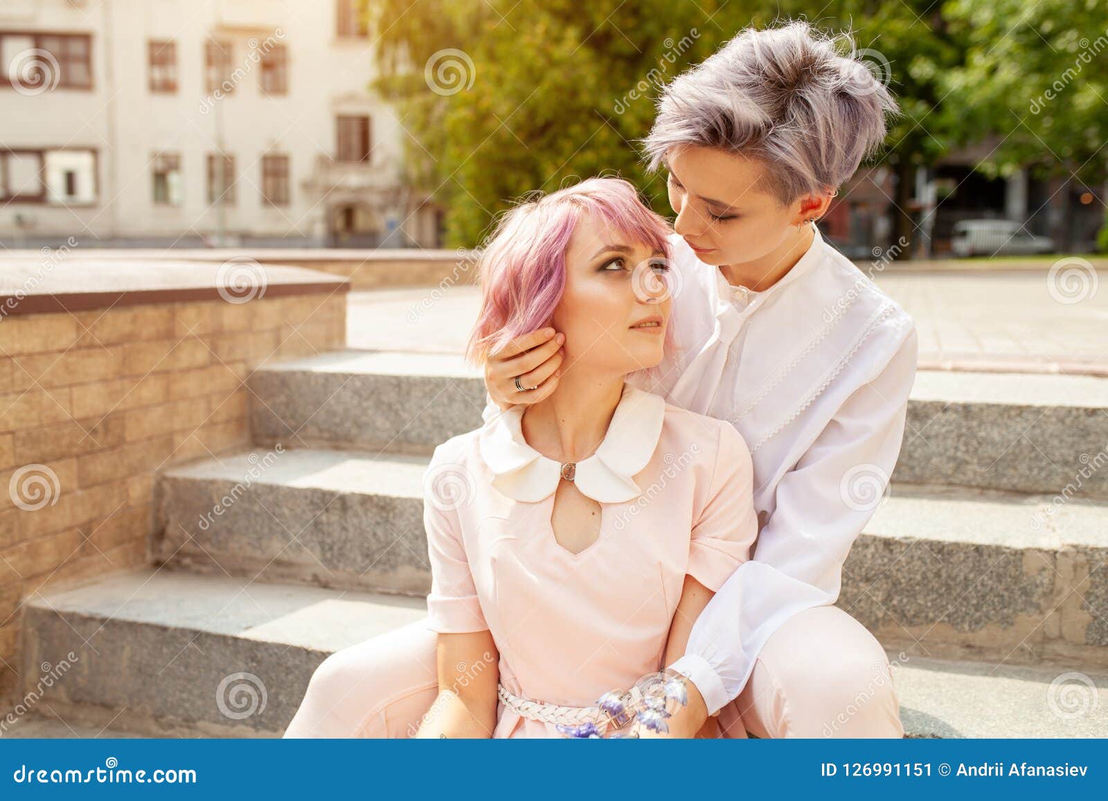 Two Lesbian Girls Sitting On The Stairs In The City Stock Image Image