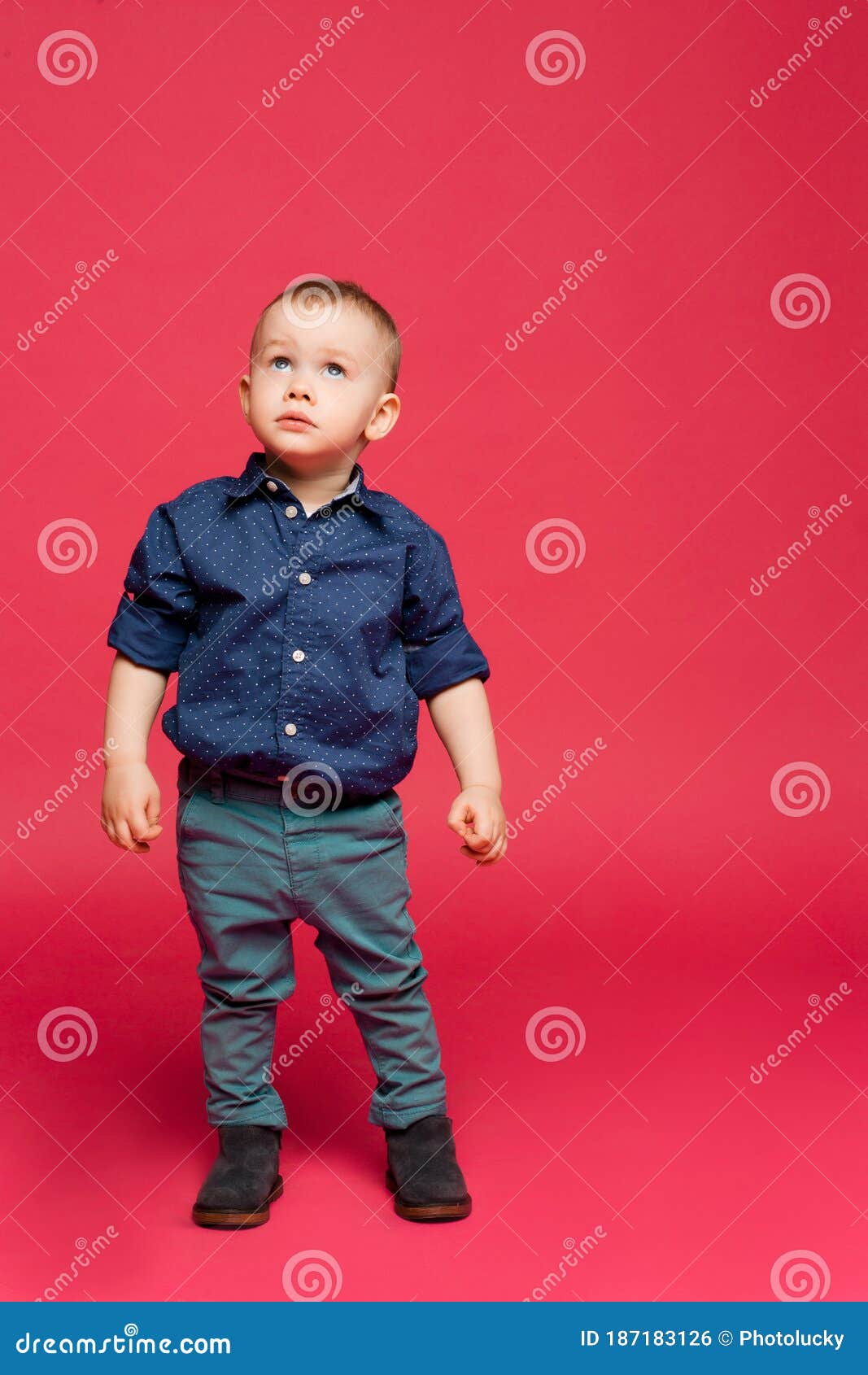 Stylish Little Boy Surprised Looking Up Playing at Studio. Stock Photo -  Image of casual, cheerful: 187183126