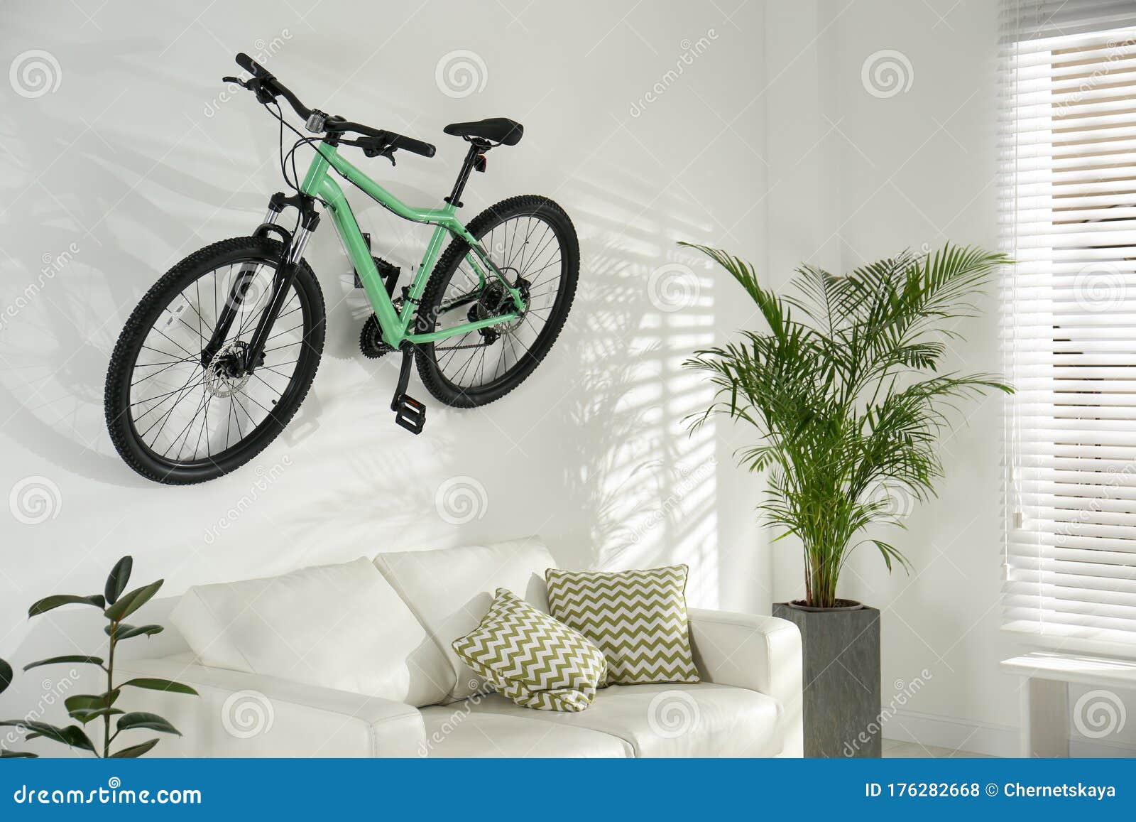 Stylish Living Room Interior With White Sofa And Bicycle ...