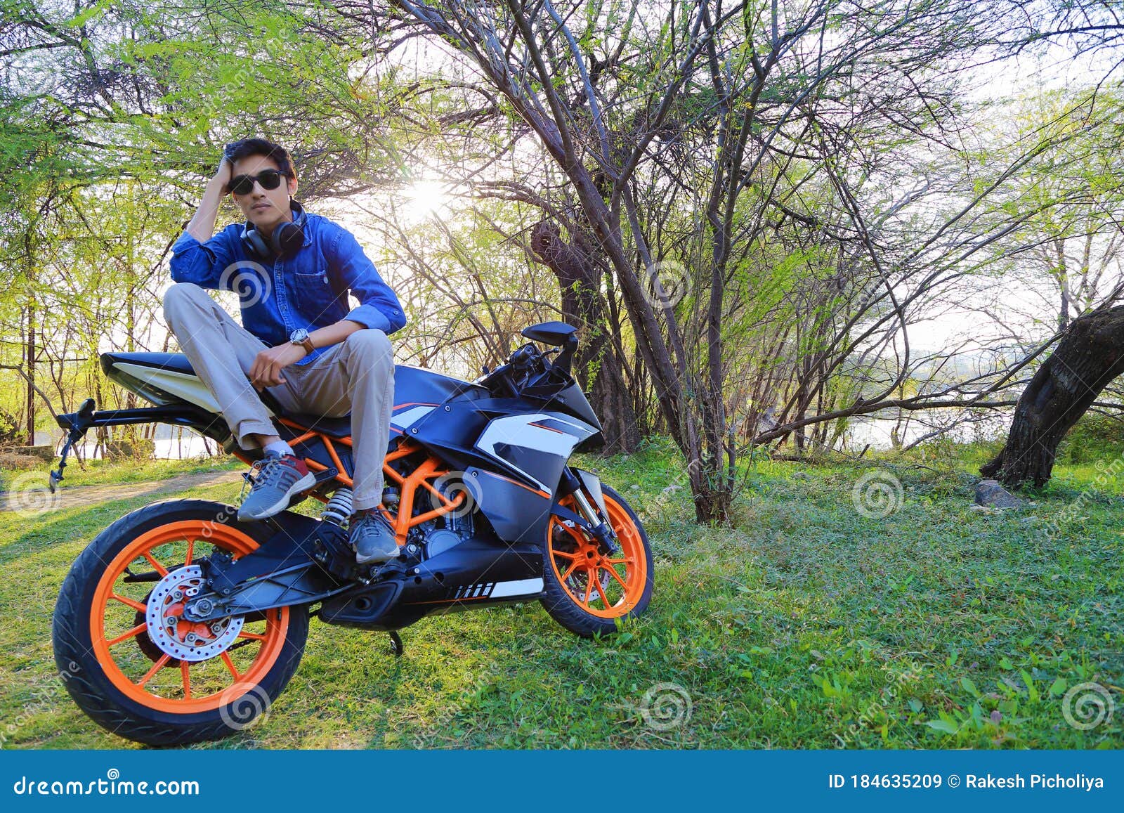 Man standing pose with cycle hi-res stock photography and images - Alamy