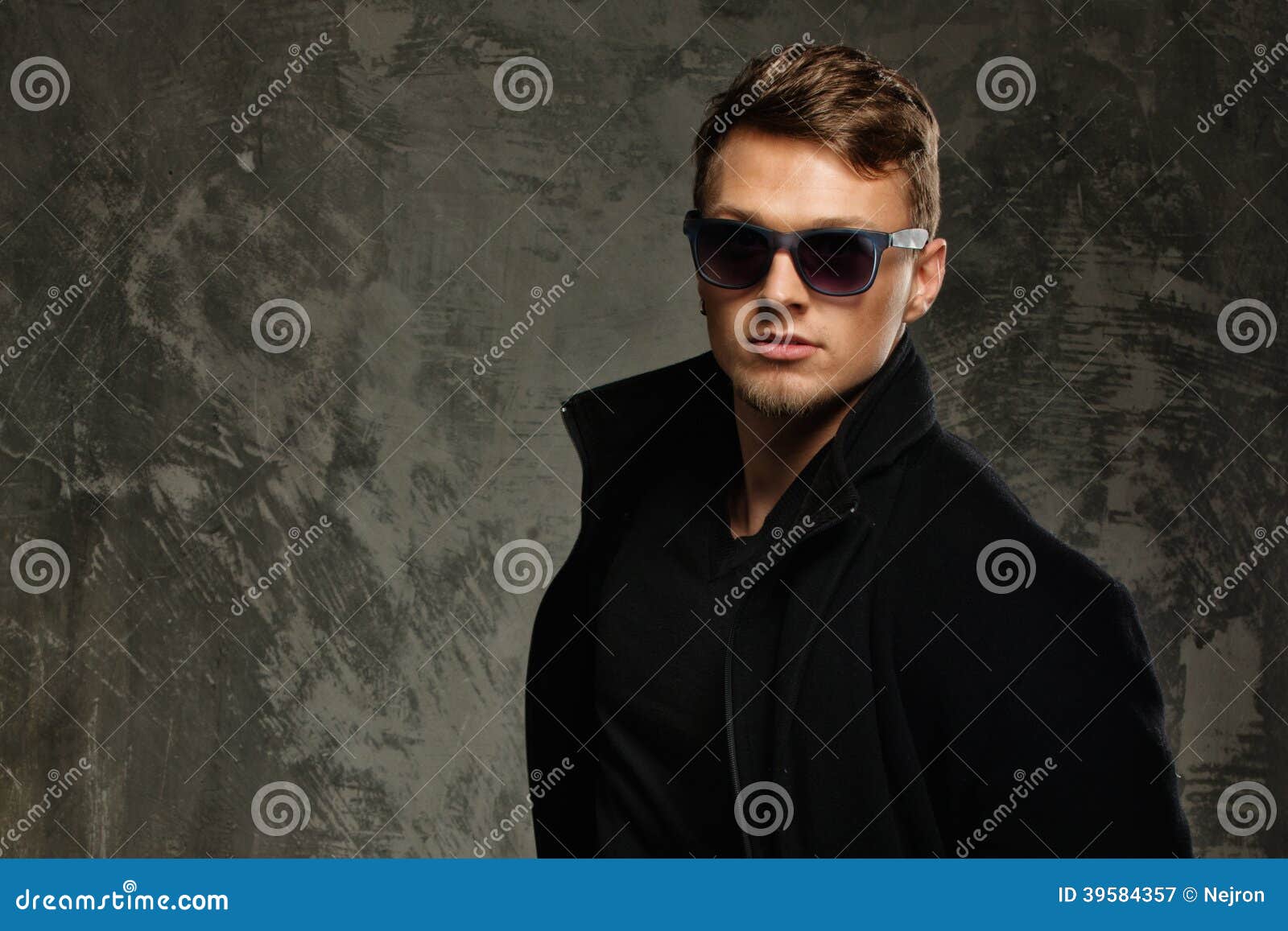 Stylish man in black coat stock image. Image of muscle - 39584357