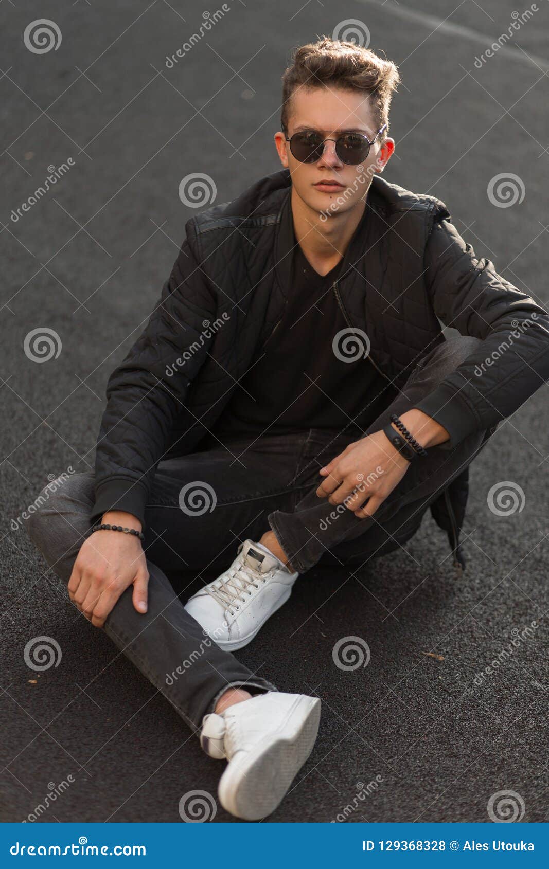 Stylish Man in Black Trendy Clothes with Sunglasses Stock Photo - Image ...