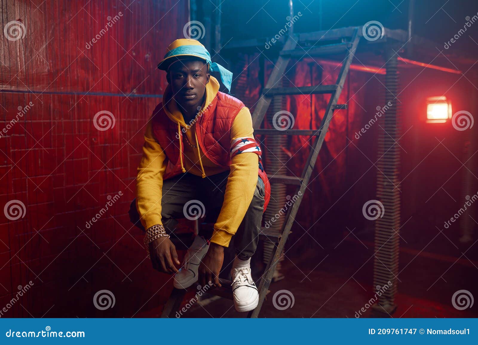 Stylish Rapper Poses on Stairs in Grunge Studio Stock Image - Image of ...