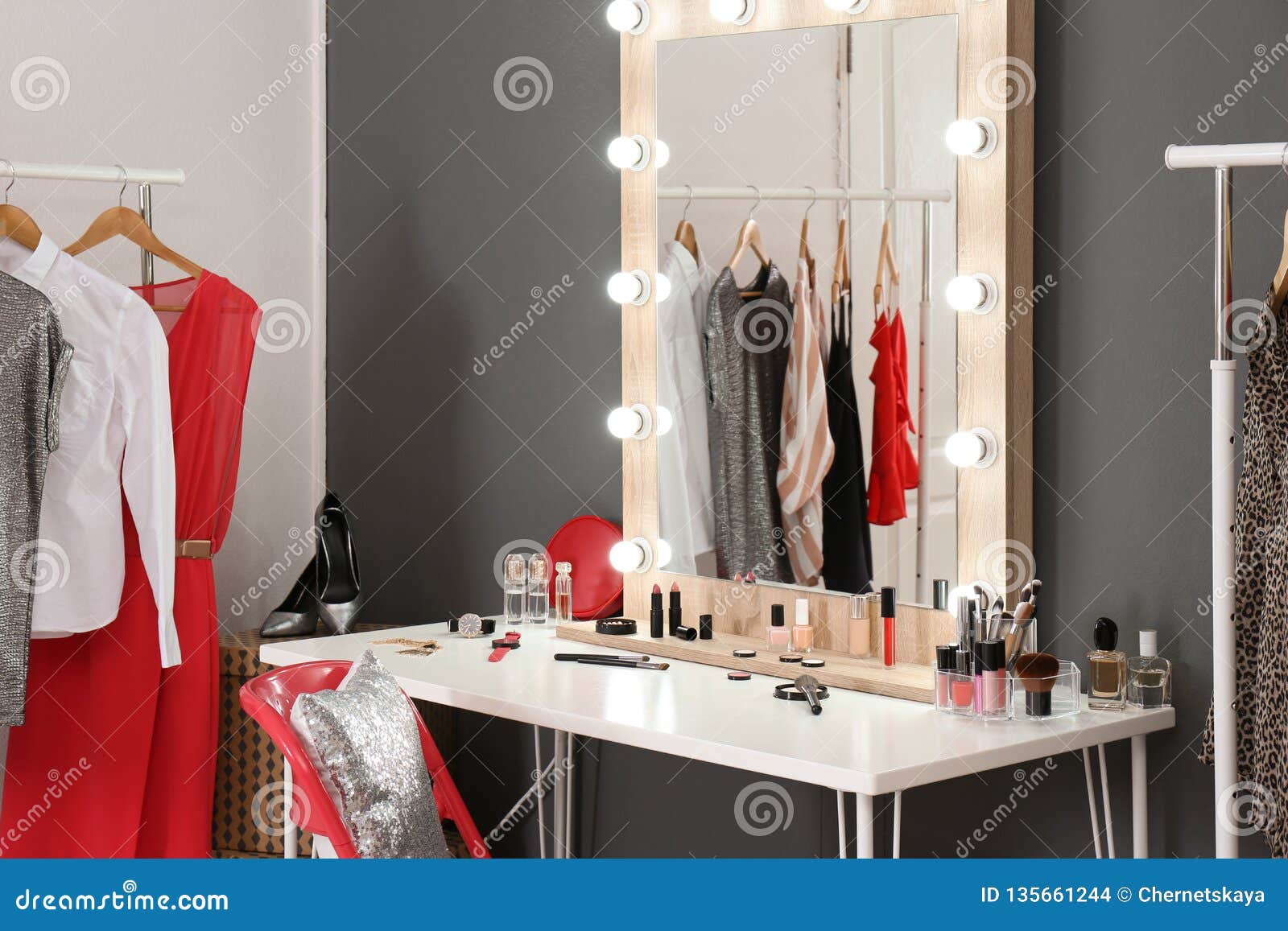 Stylish Room With Dressing Table Mirror And Rack Stock