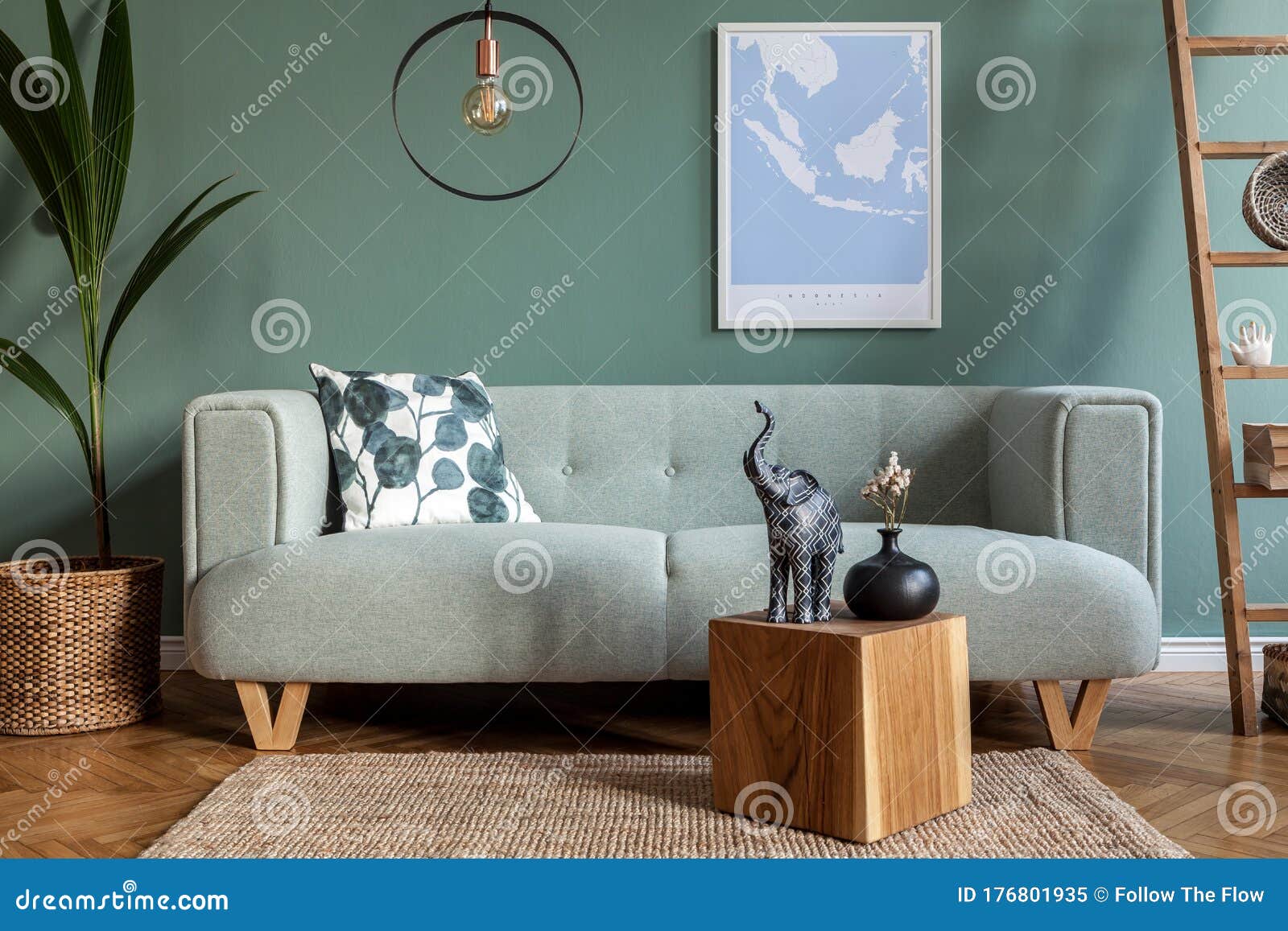 stylish, scandinavian living room with mint sofa.