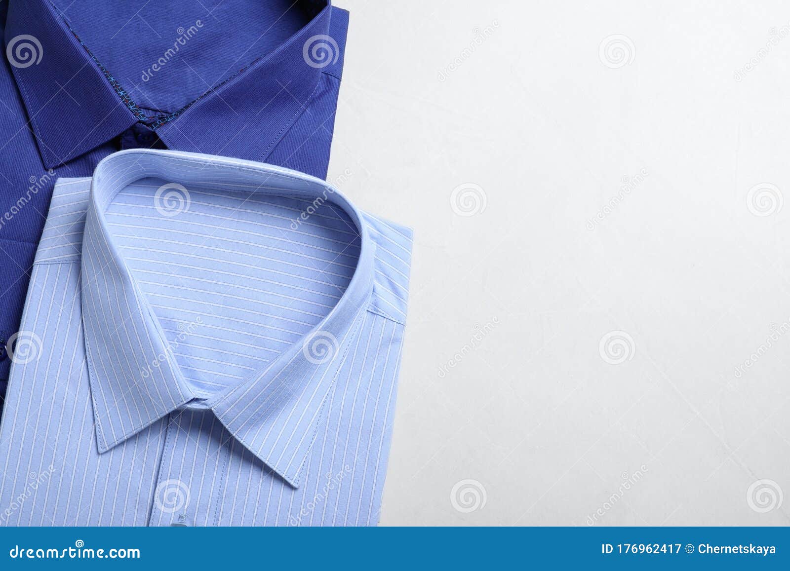 Stylish Shirts on Table, Flat Lay with Space for Text. Dry-cleaning ...