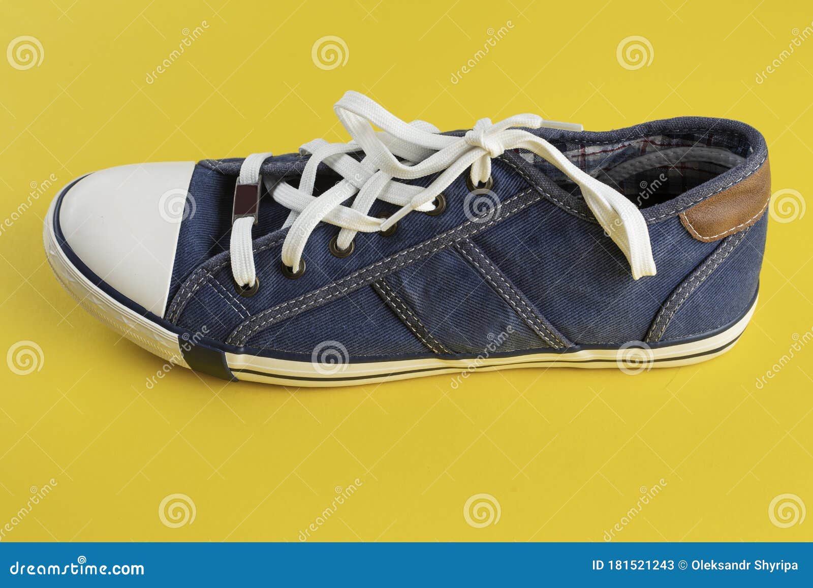 Stylish Sneaker on a Yellow Background. Youth Shoes Stock Image - Image ...