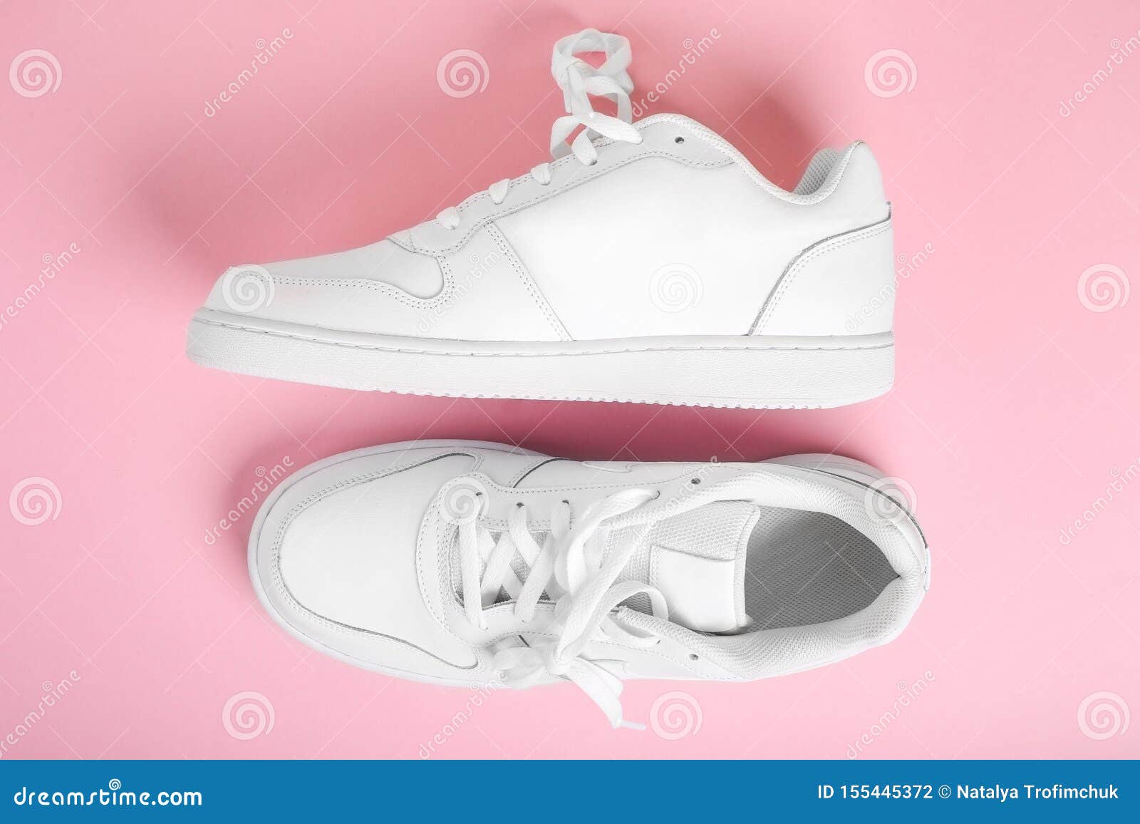 Stylish Summer White Running Shoes on a Pink Background, Top View. Flat ...