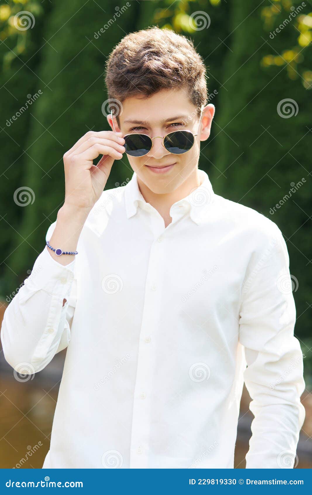 Stylish Teenager 16-18 Years Old in Sunglasses Outdoors on the Background  of Nature. Adolescence Stock Photo - Image of caucasian, teenager: 229819330