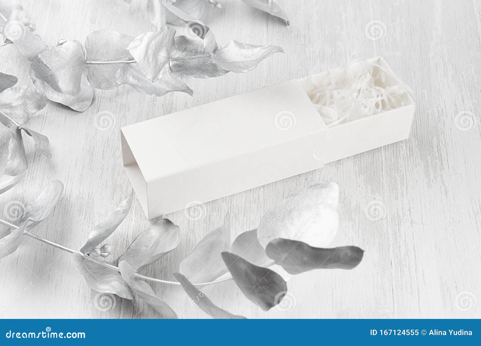 Download Stylish White Blank Open Rectangle Gift Box With Paper Filler Mock Up On Wood Board Silver Leaves Side View For Design Branding Stock Image Image Of Luxury Board 167124555