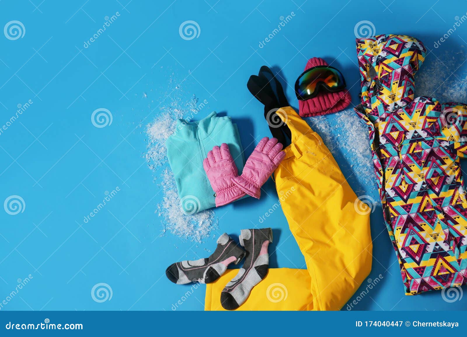 Stylish Winter Sport Clothes on Blue Background, Flat Lay Stock Image