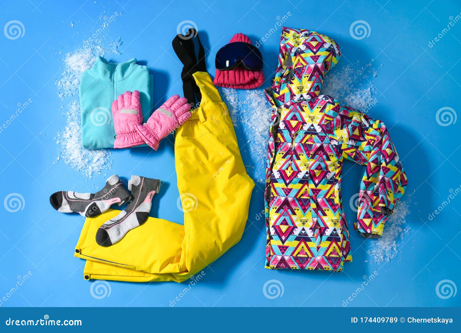 Stylish Winter Sport Clothes on Blue Background, Flat Lay Stock Image