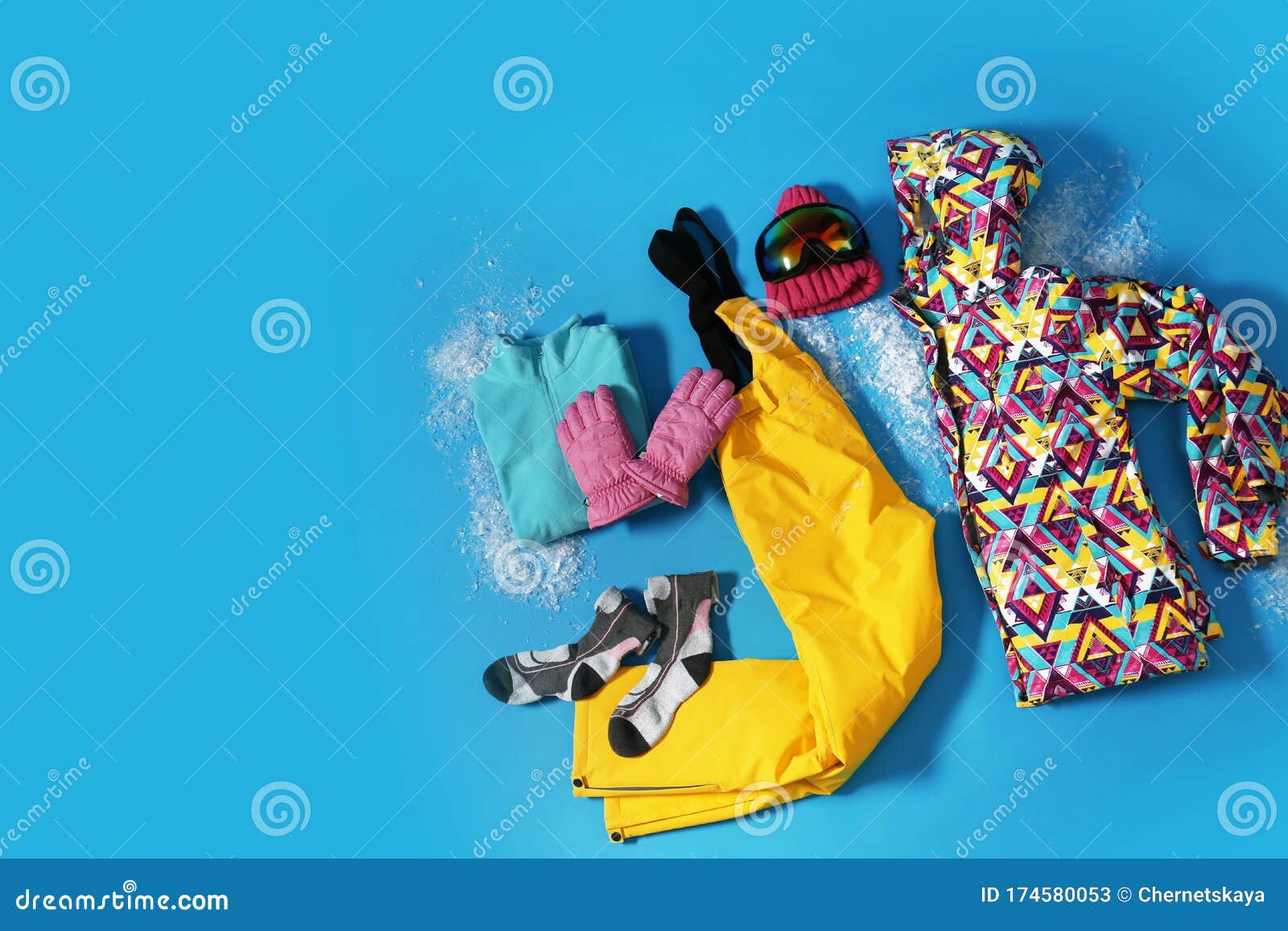 Stylish Winter Sport Clothes on Light Blue Background, Flat Lay Stock