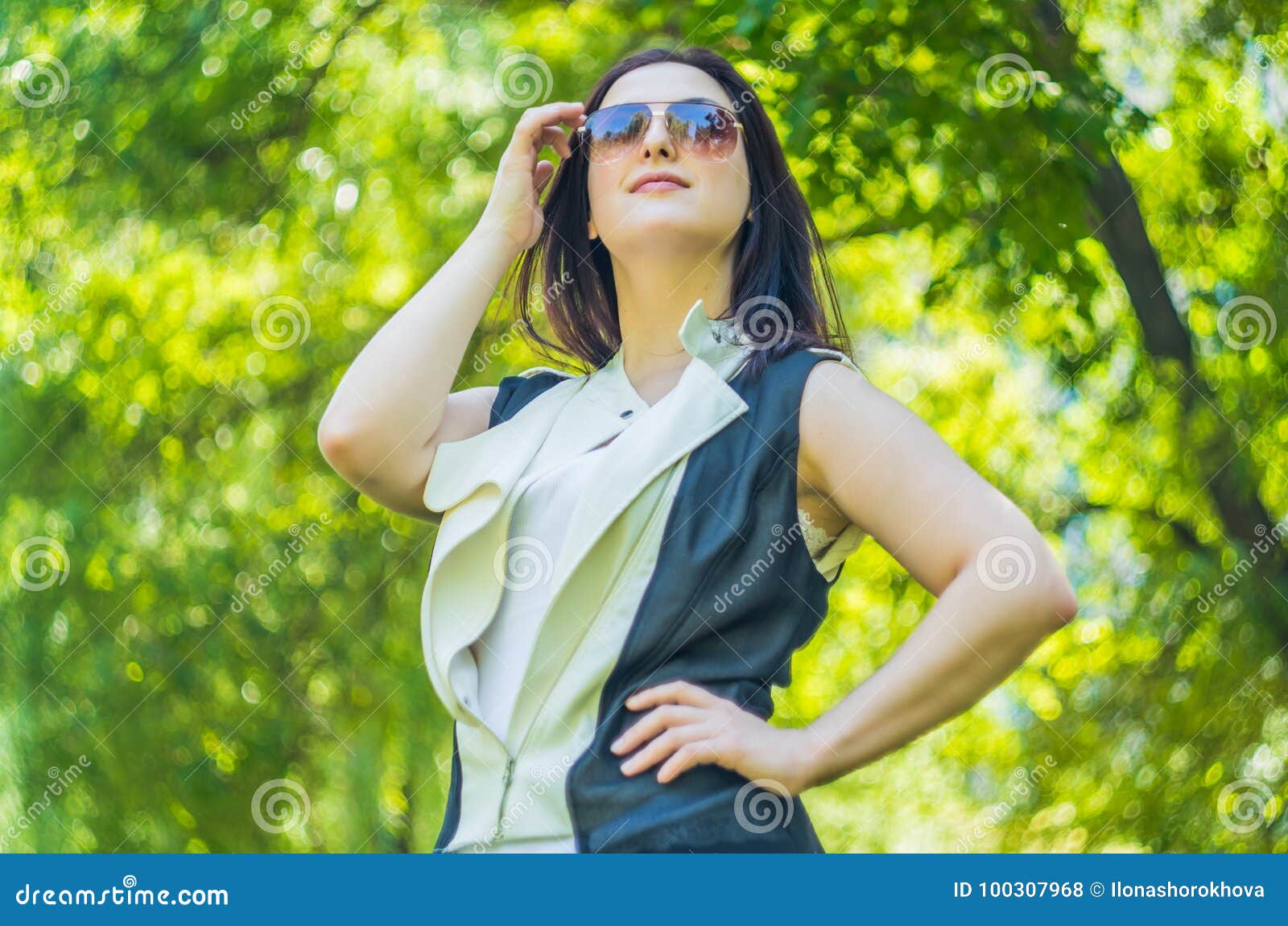 Stylish woman in the park stock photo. Image of lifestyle - 100307968