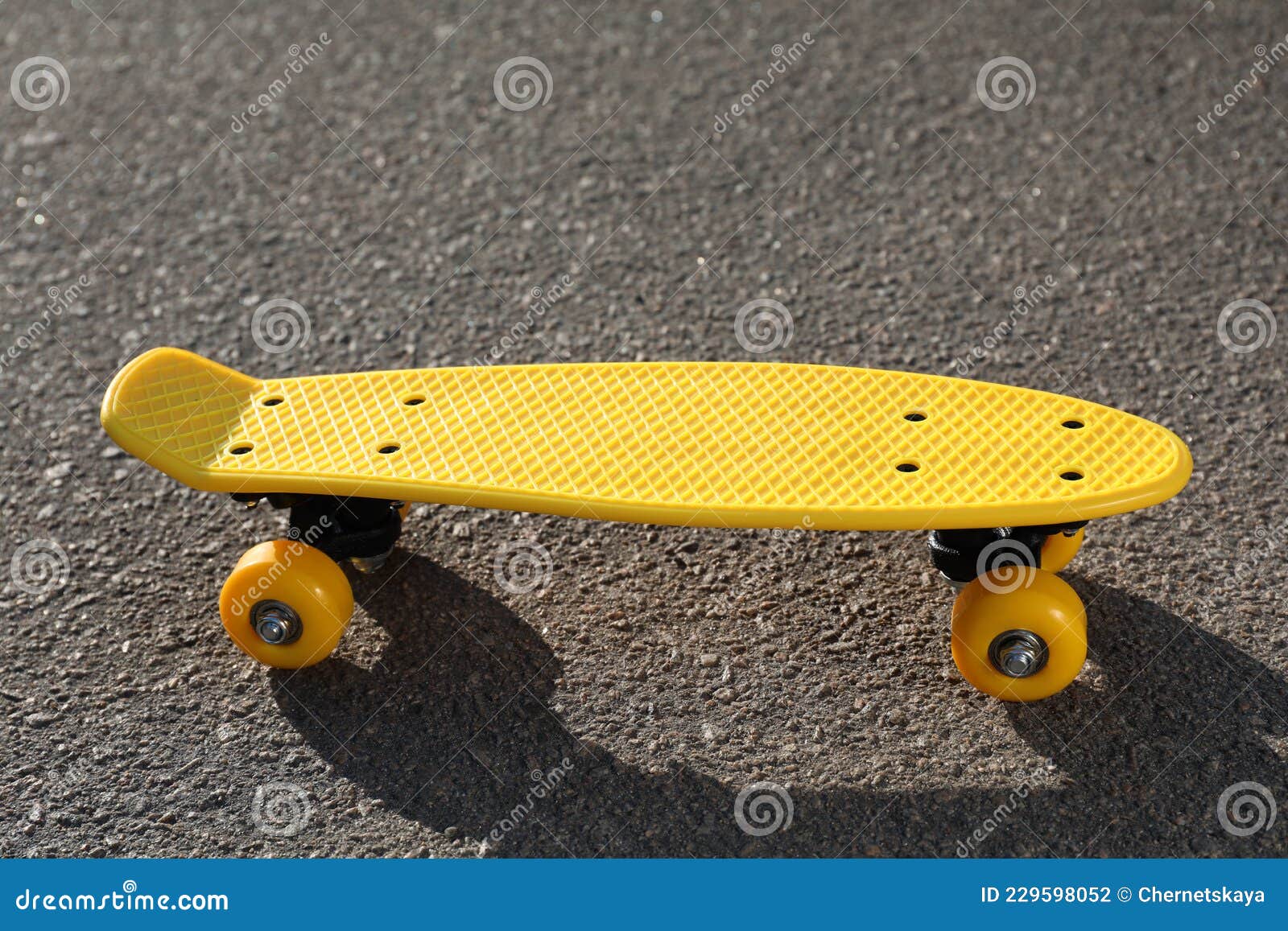 Stylish Yellow Skate Board on Asphalt Outdoors Stock Photo Image of