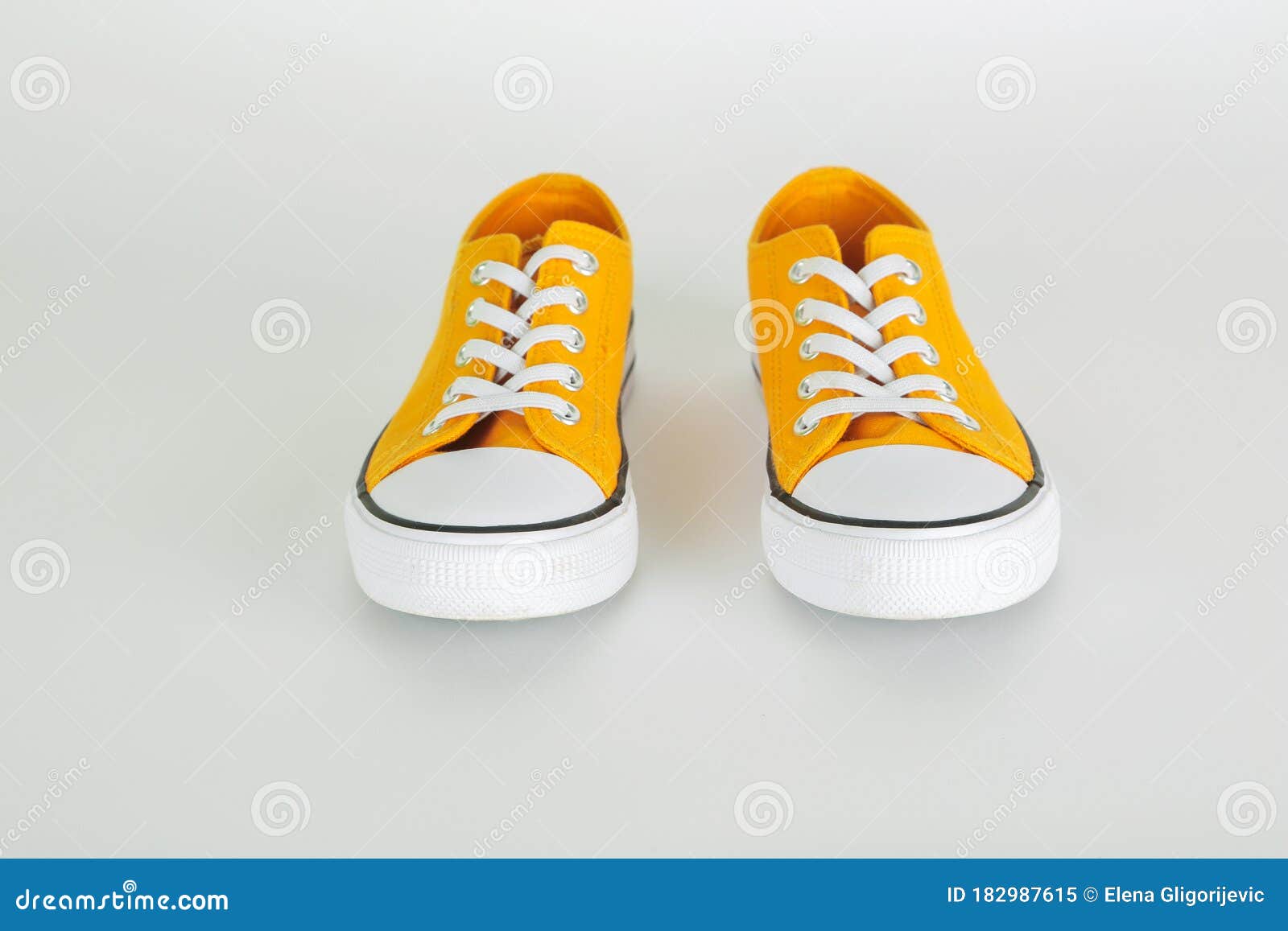 Stylish Yellow Sneakers Shoes on White Background Stock Image - Image ...