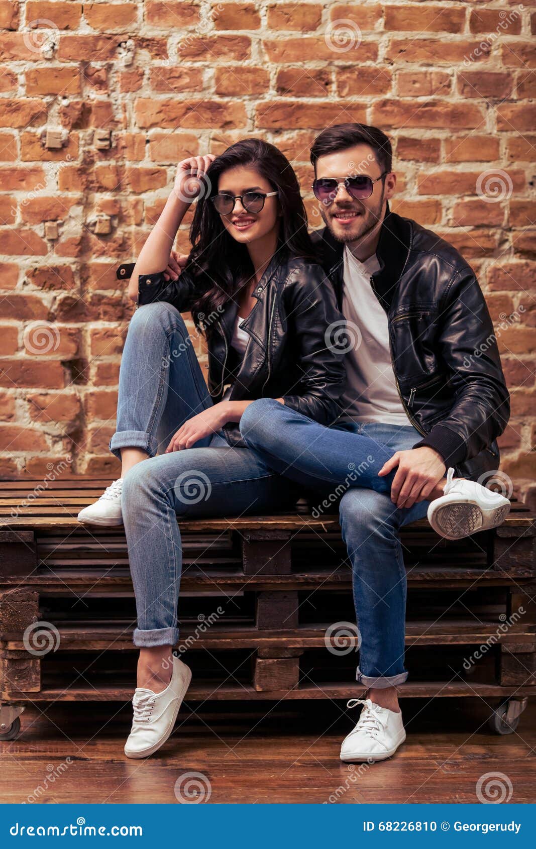Stylish young couple stock photo. Image of bonding, denim - 68226810